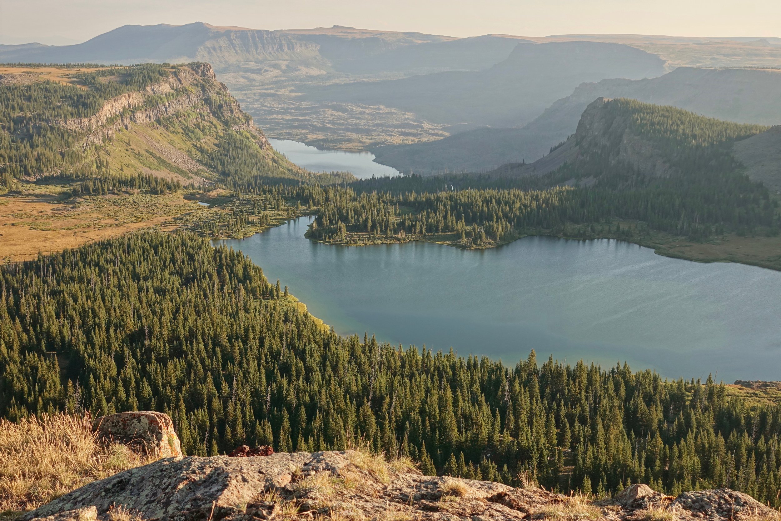 Trappers Peak Summit early morning over Wall Lake in Flat Tops Wilderness of Colorado