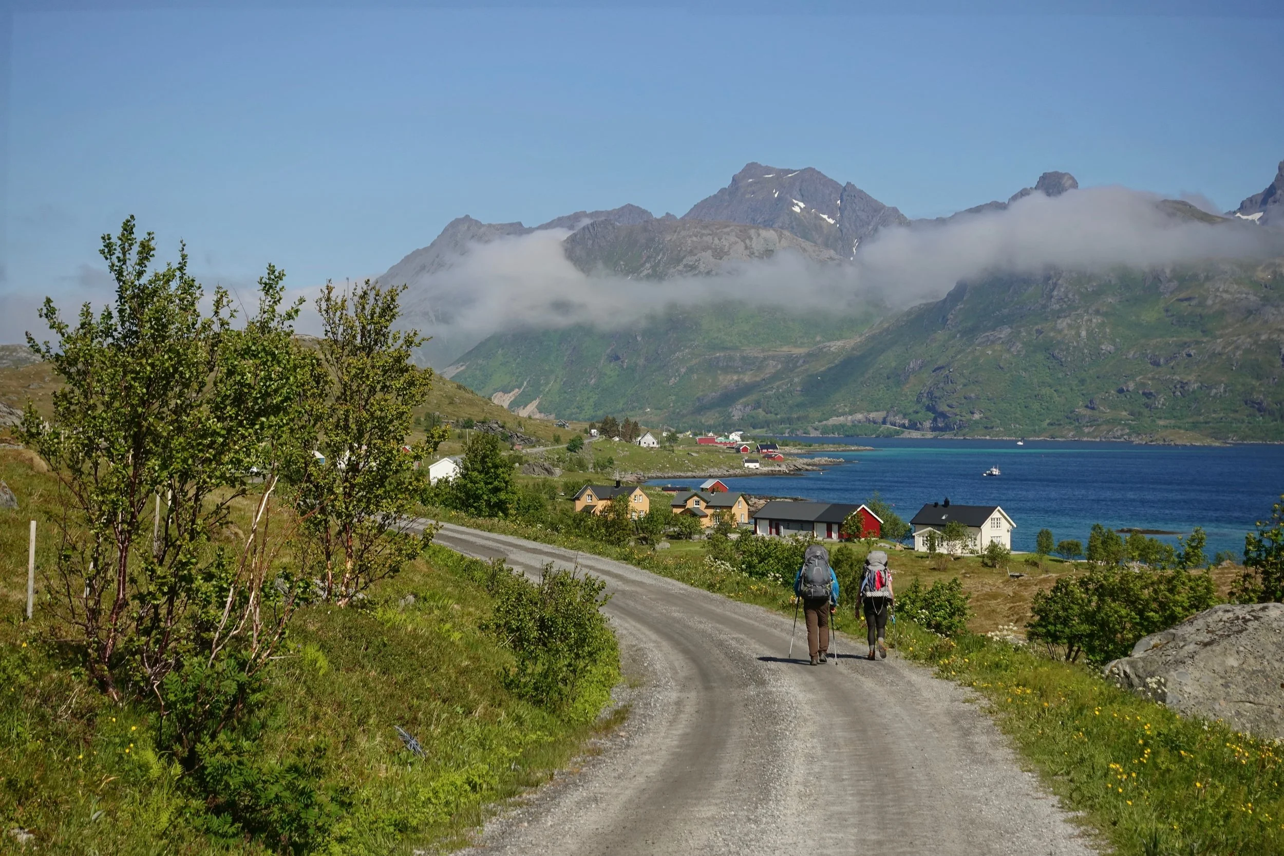 Hikers on the road in Lofoten Norway