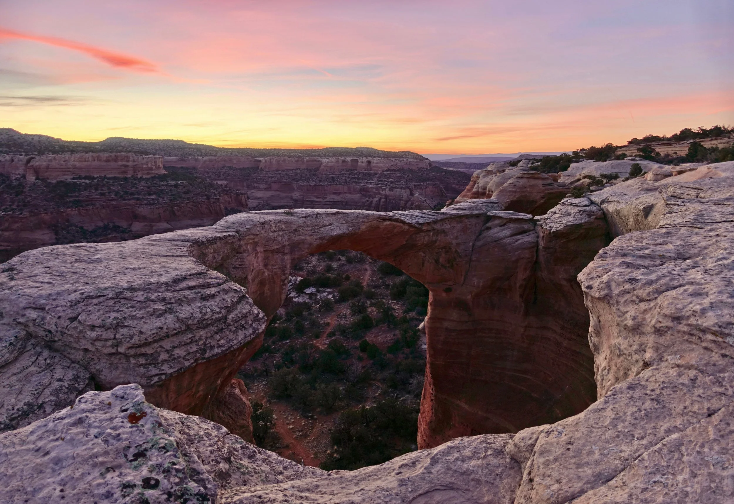 Centennial Arch or East Rim Arch above Rattlesnake Canyon in Black Ridge Wilderness Colorado
