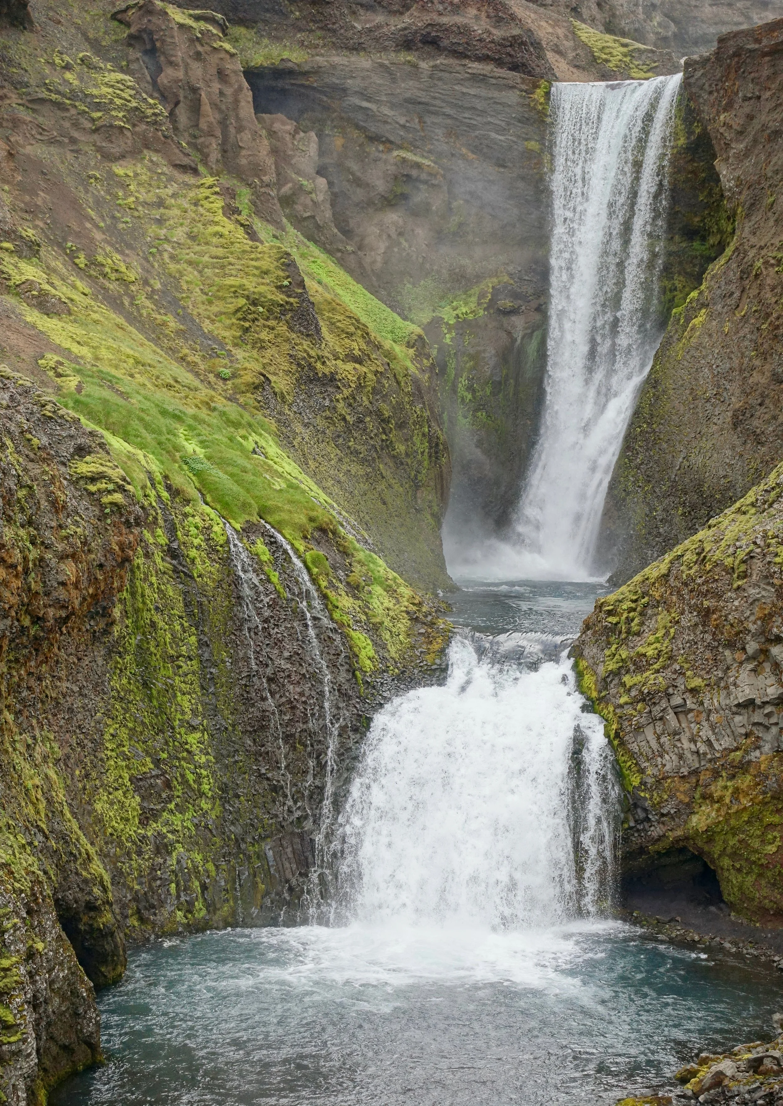 Fimmvorduhals hike in Iceland waterfall going up the trail