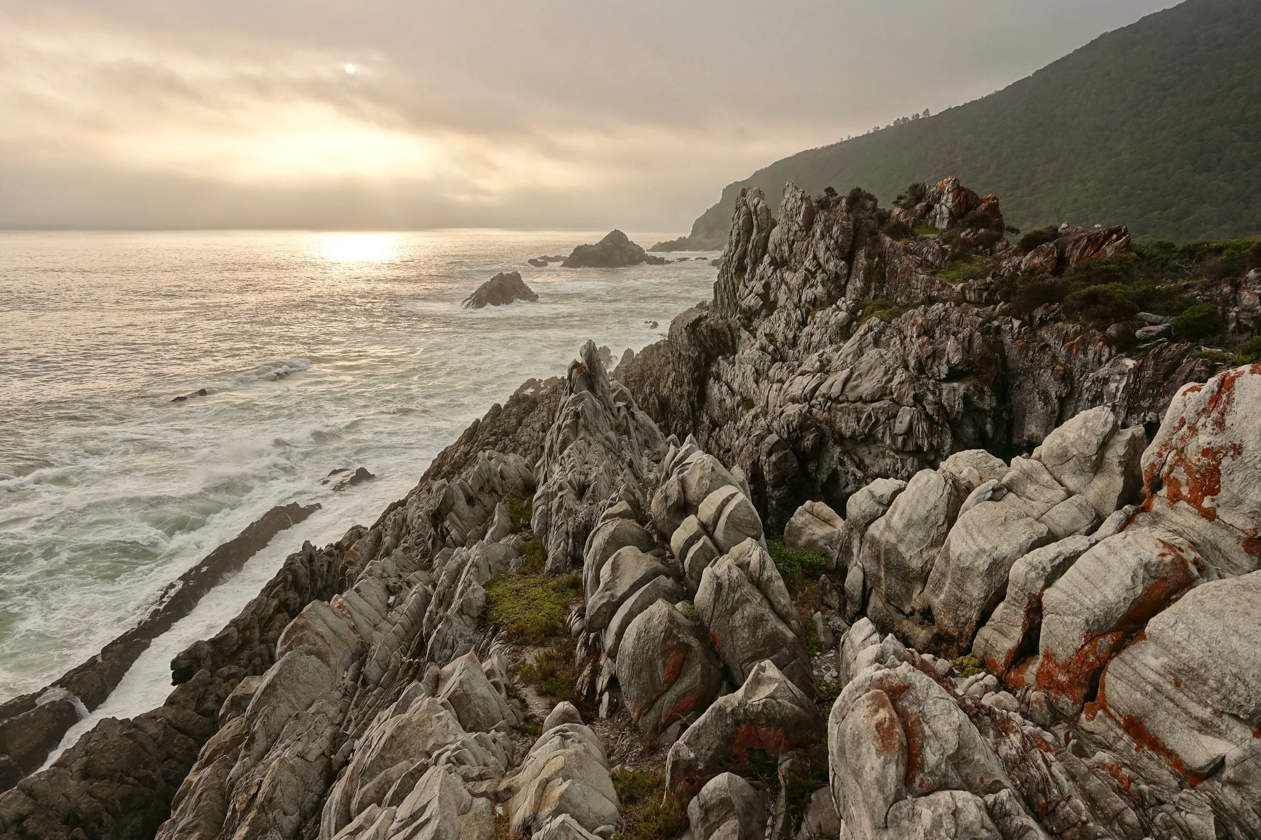 Smoky sunset near the Geelhoutbos on Otter Trail hike in South Africa
