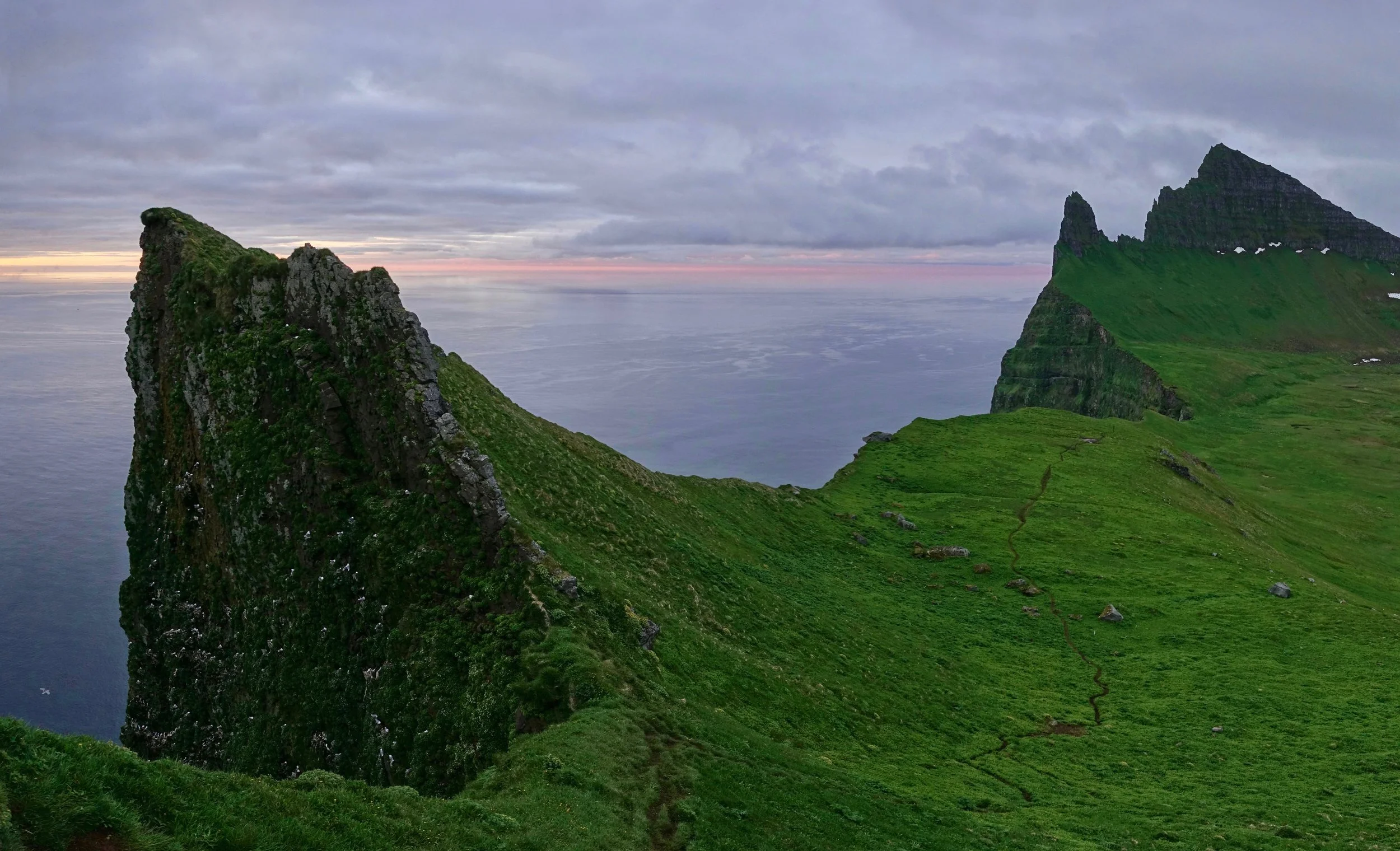 Kalfatindar and the Hornbjarg cliffs on an early morning hike in Hornstrandir Iceland