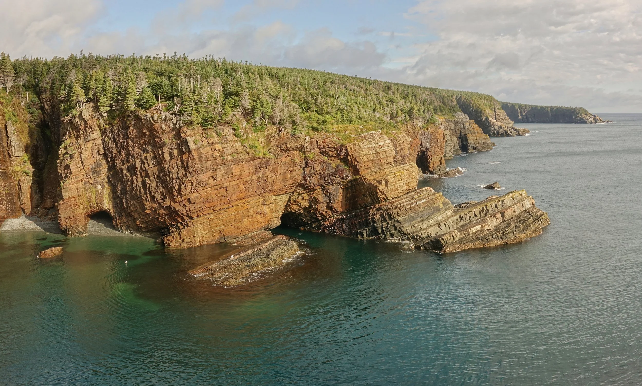 Cliffs at Stiles Cove in the sun in Newfoundland