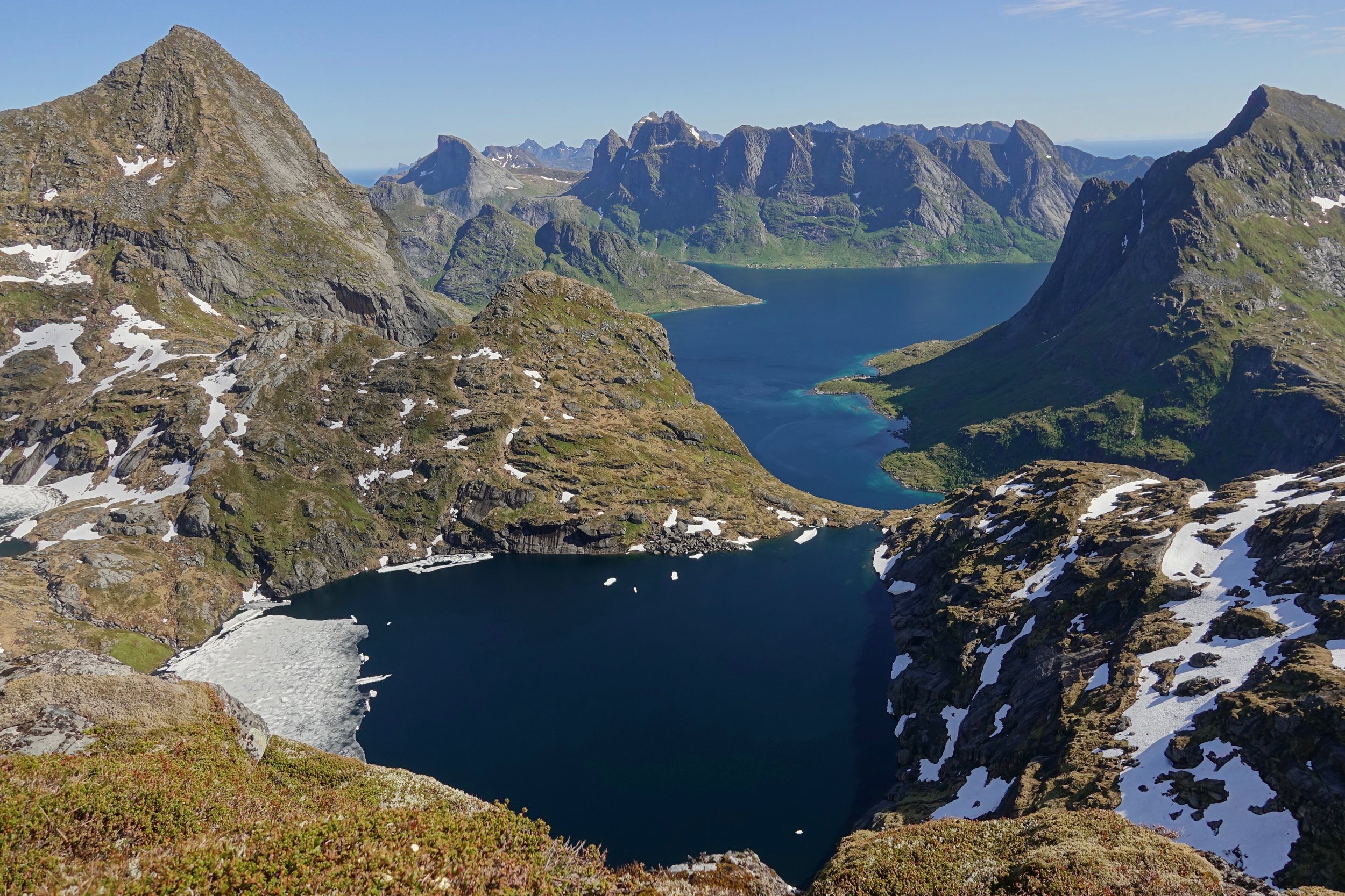 Climbing Hermannsdalstinden peak in Lofoten Norway
