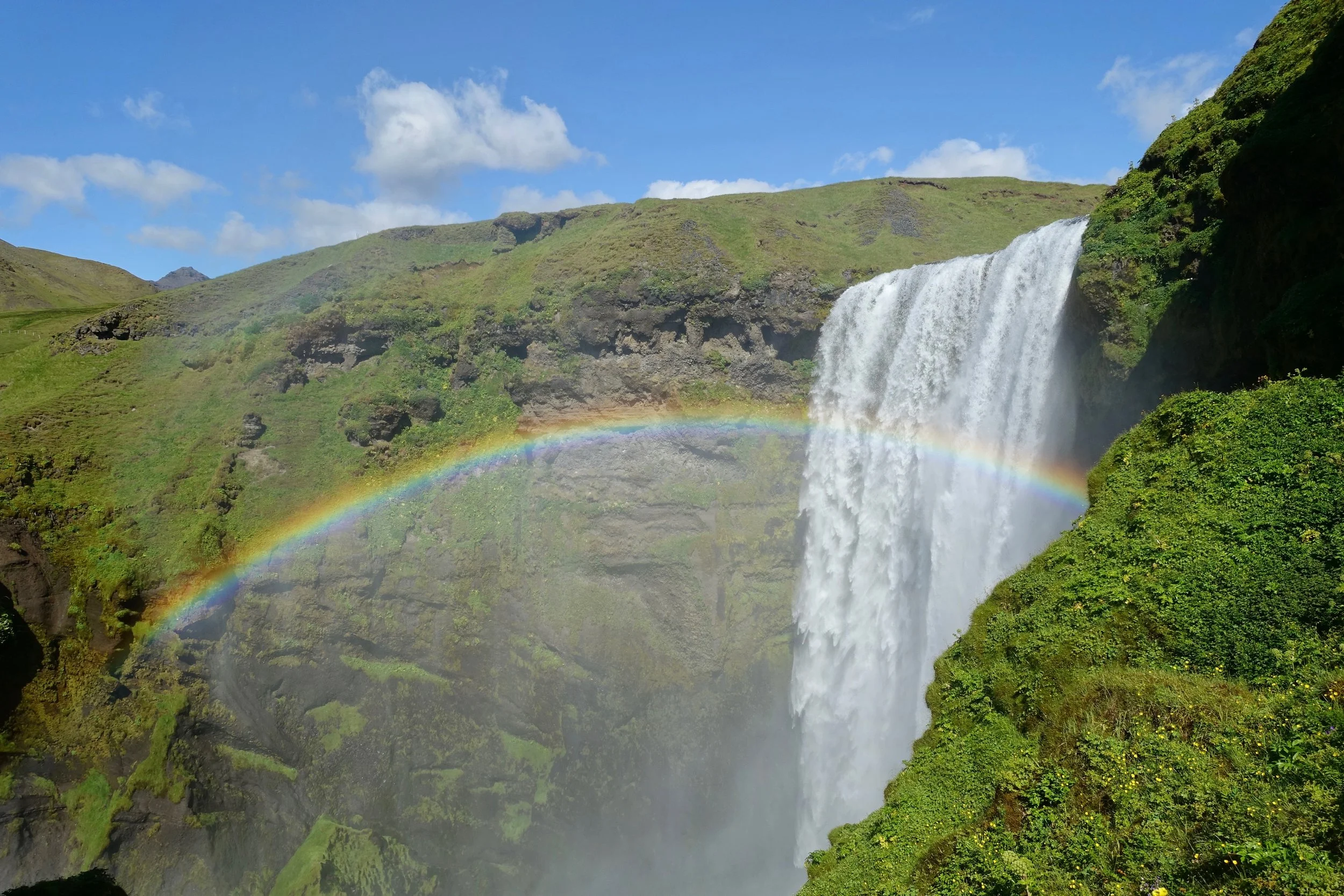 Rainbow over Skogafoss on Fimmvorduhals hike in Iceland