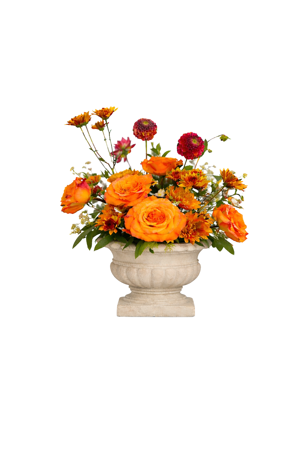 A floral arrangement with orange roses, yellow and orange marigolds, and small white flowers in a white stone vase.