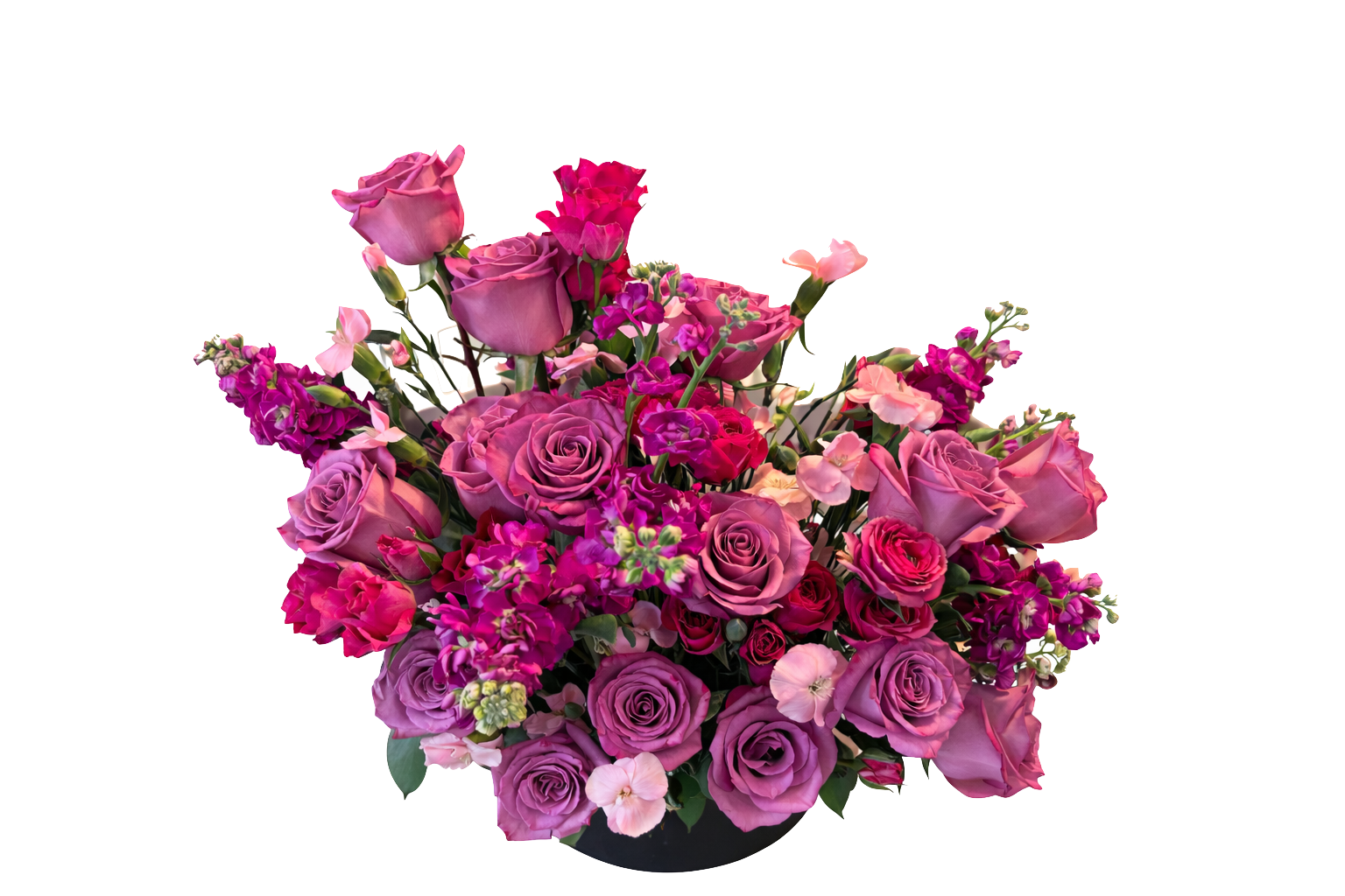 A bouquet of purple, pink, and magenta roses, lisianthus, and snapdragons in a black vase.