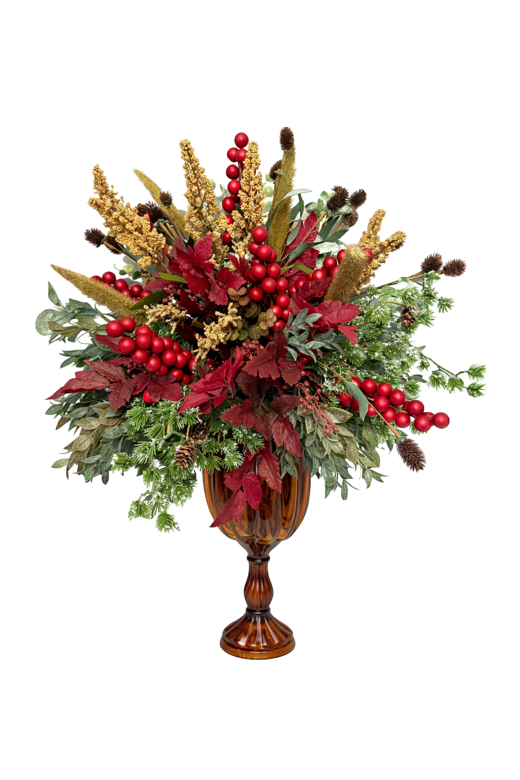A decorative floral arrangement in a tall, ornate brown vase with red berries, green leaves, and yellow and brown dried flowers for the holiday season.