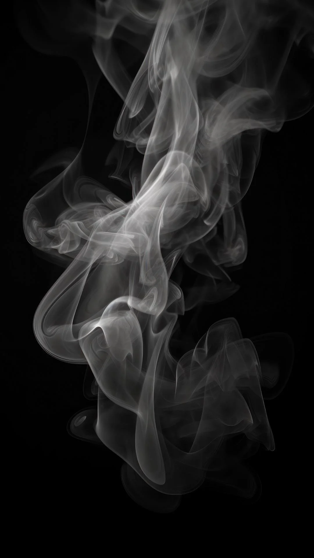Swirling white smoke against a black background.