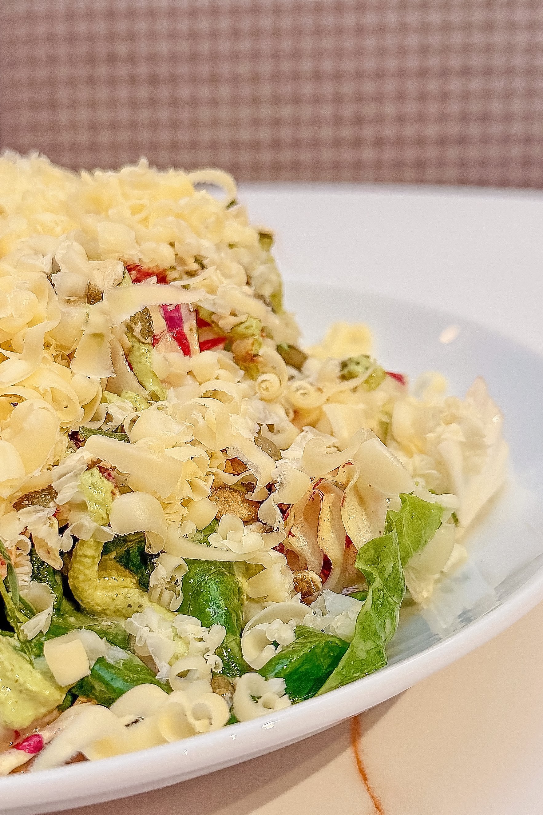 Seasonal salad with finely shaved cheese and fresh greens from the Chef Cliff Crooks menu at Viv & Jules.