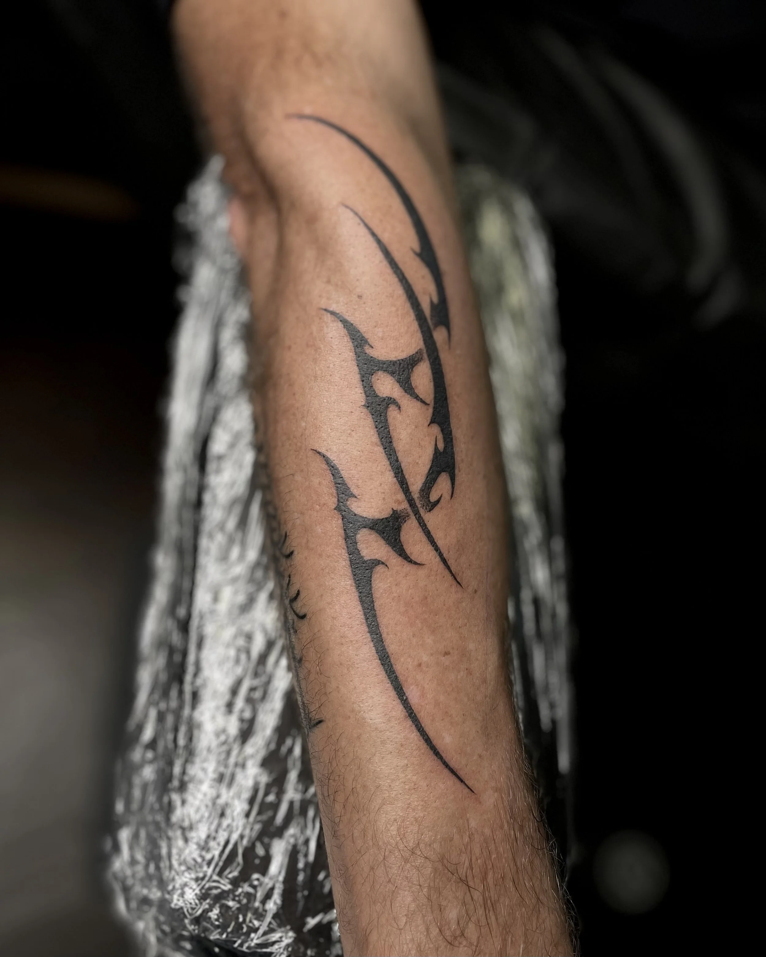 neo tribal/ cyber sigilism forearm tattoo