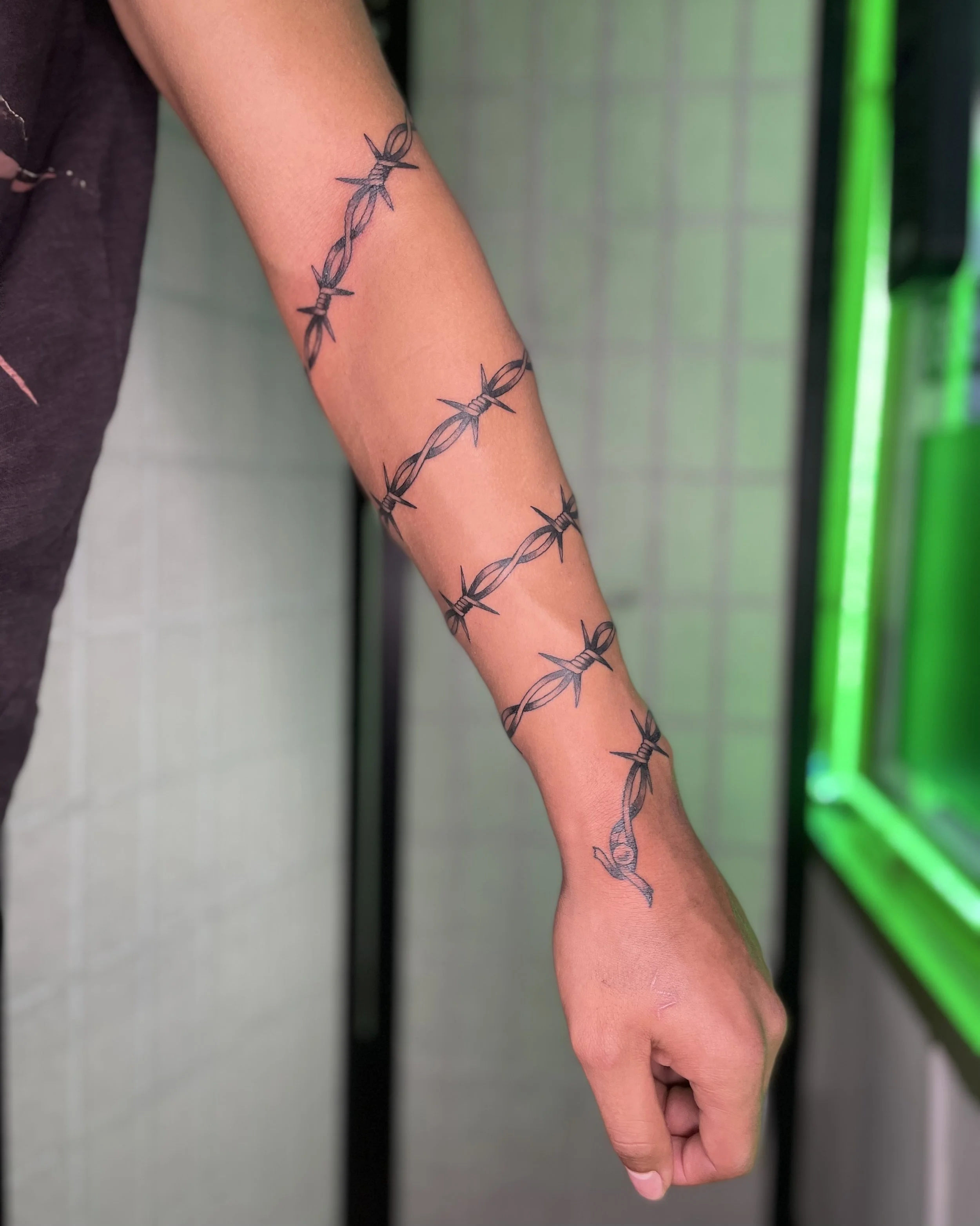 barbed wire  forearm tattoo