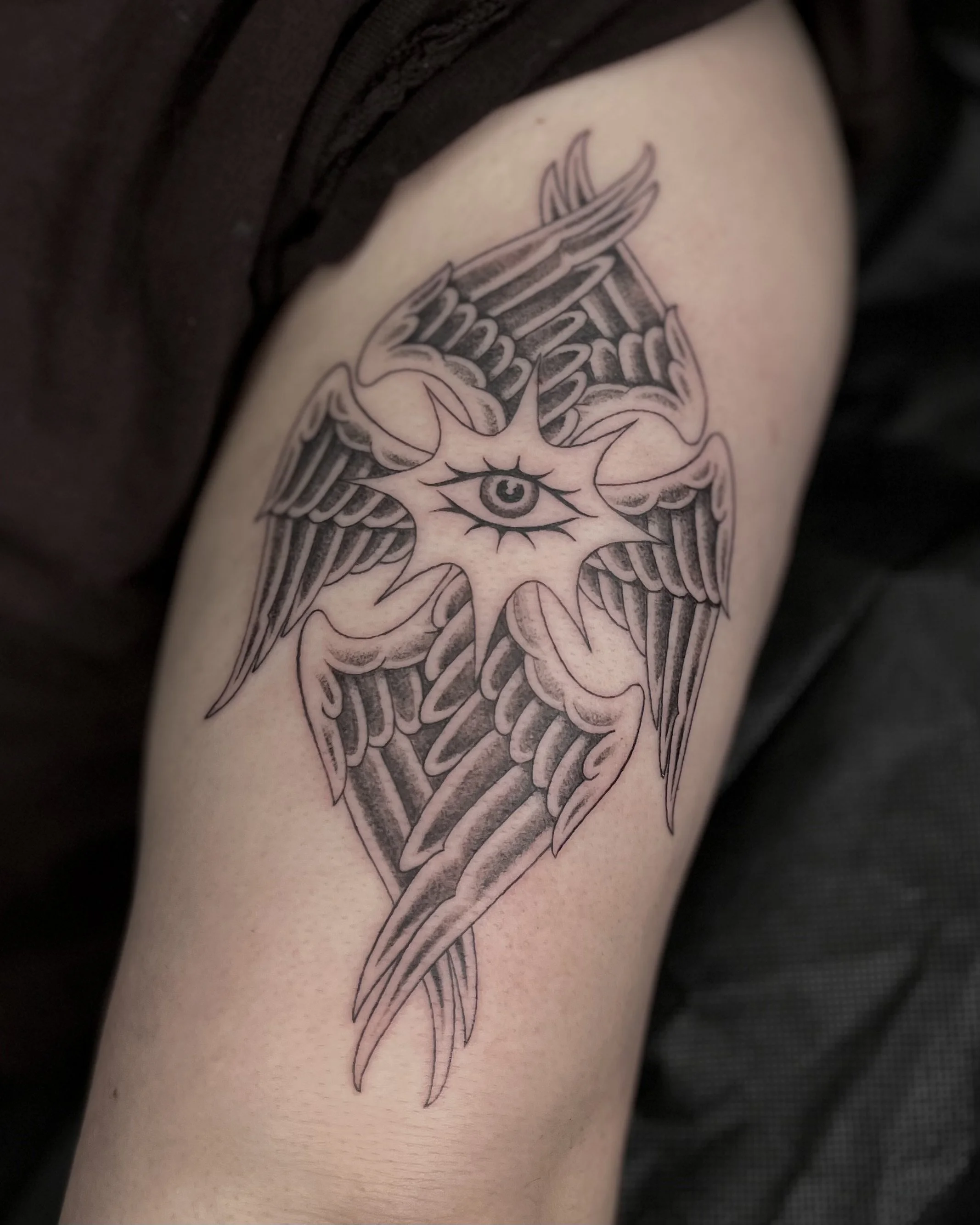 black and grey fineline seraphim tattoo