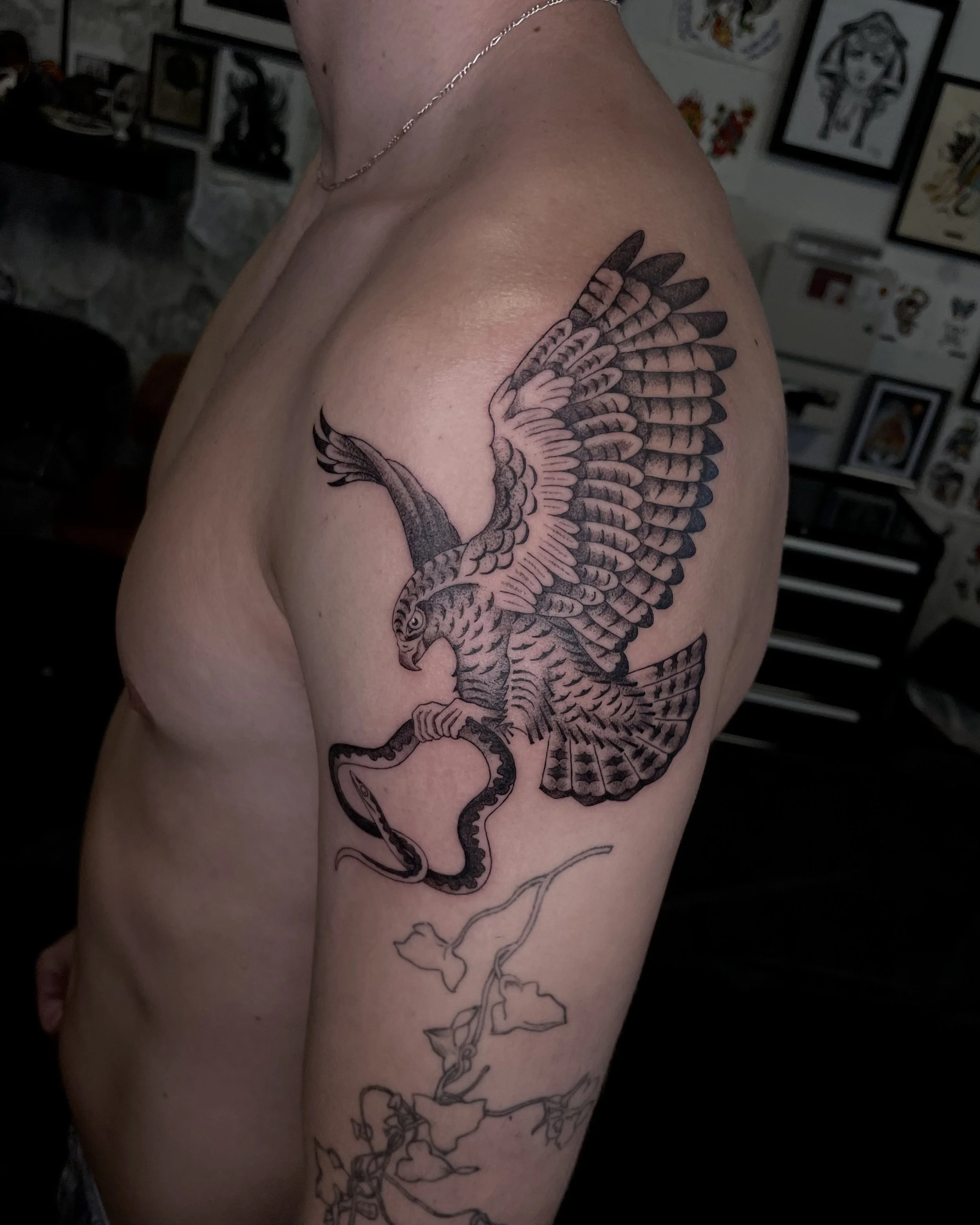 fineline black and gray hawk tattoo