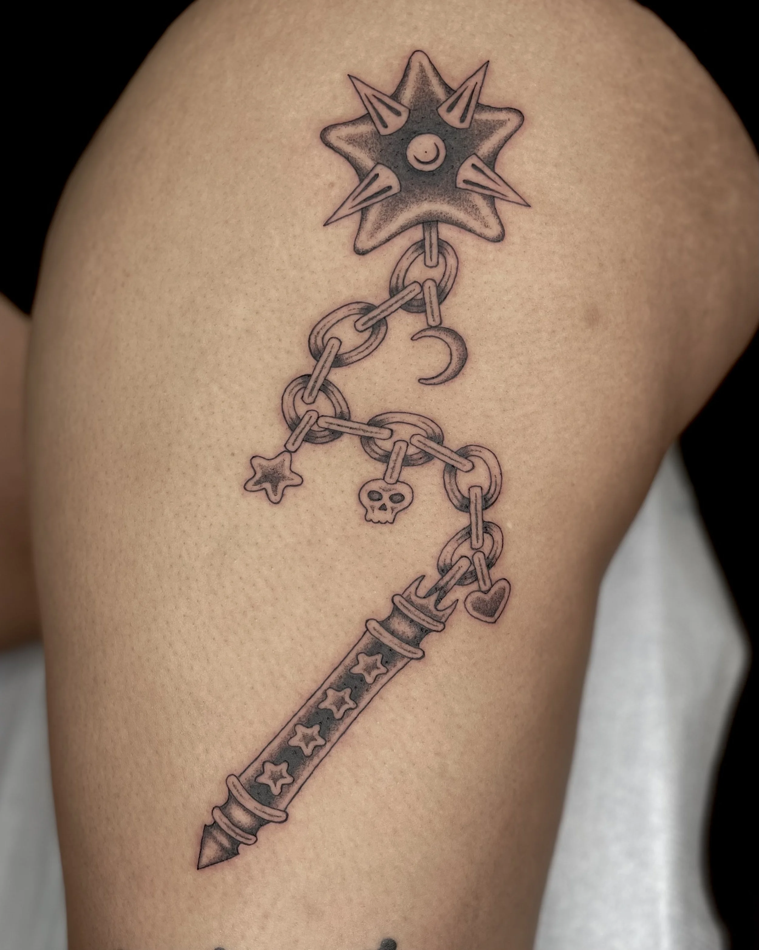  star flail and charms tattoo
