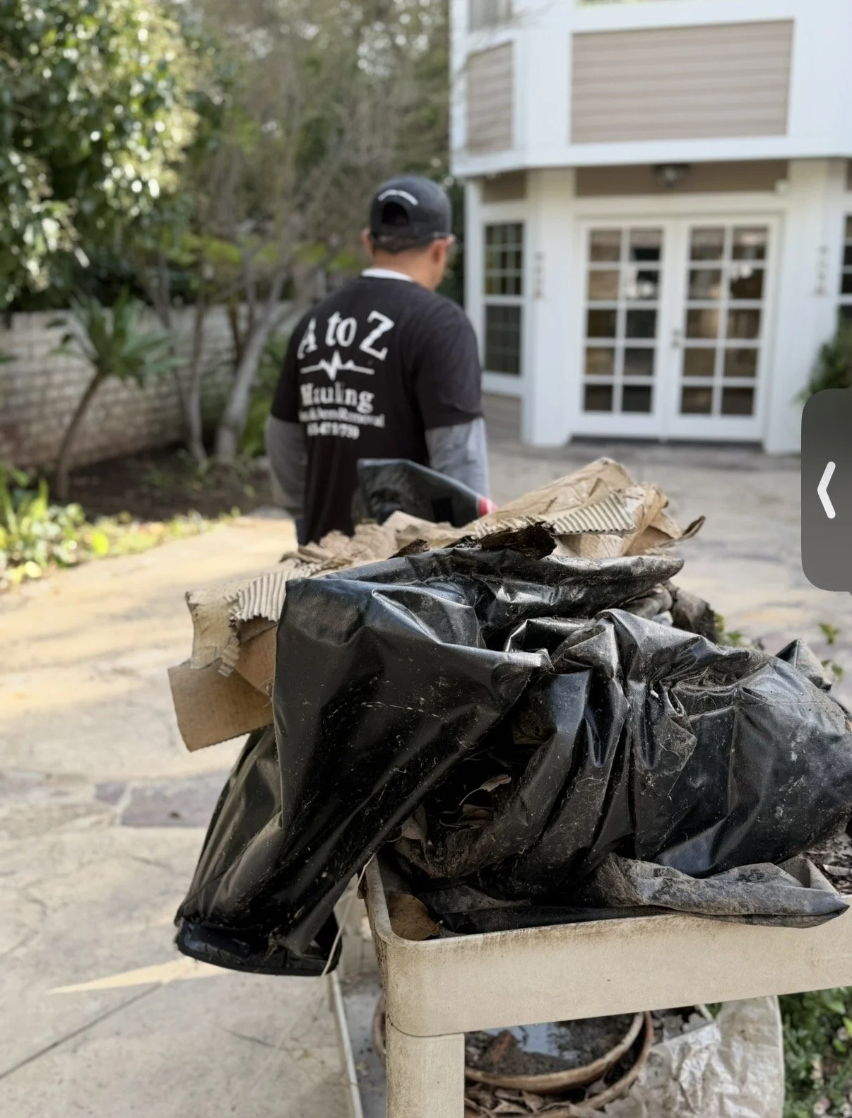 A to Z Hauling crew member doing a junk removal pickup in West Hollywood, Ca