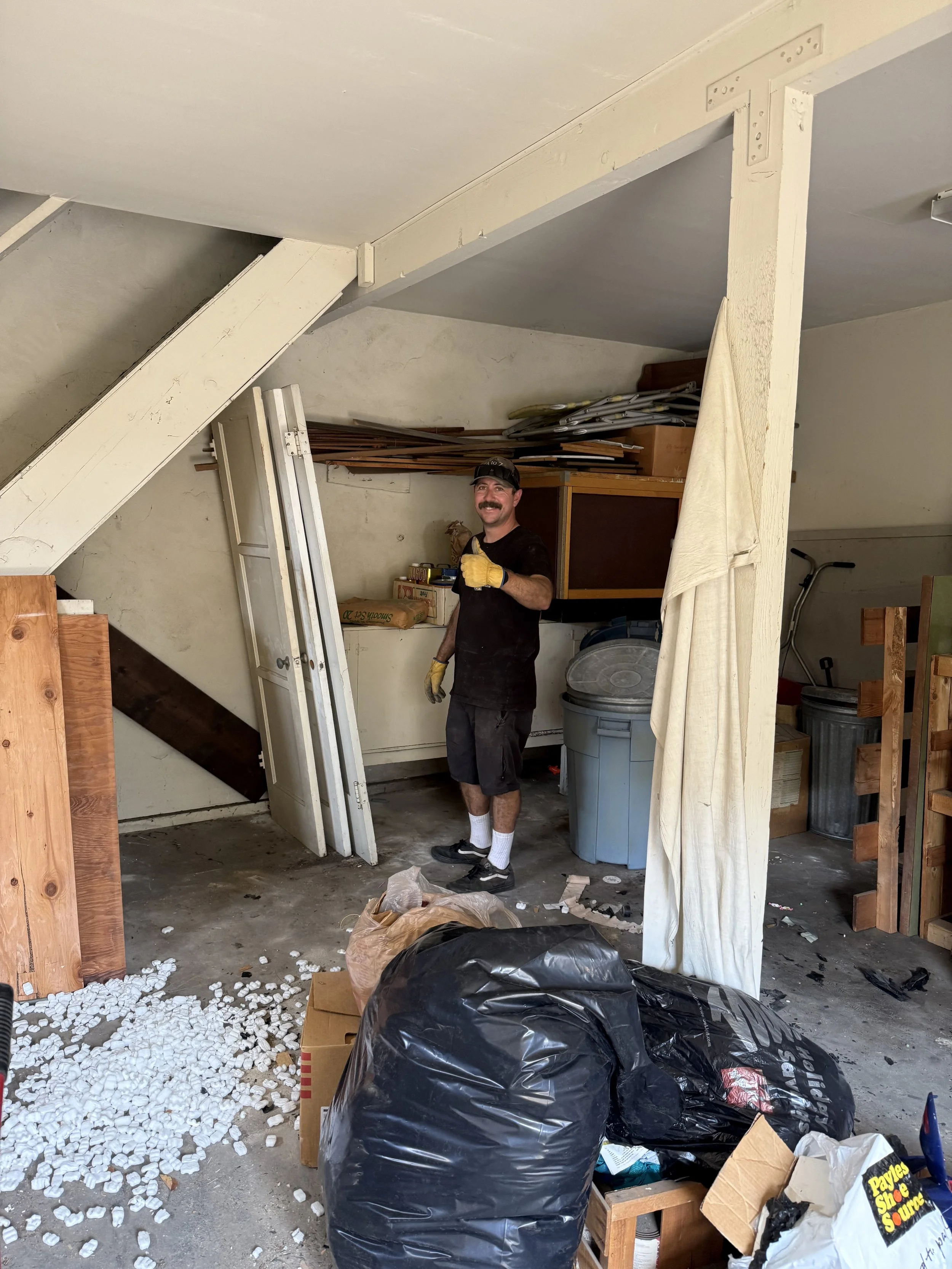 A to Z Hauling Crew member doing a garage cleanout in burbank,Ca