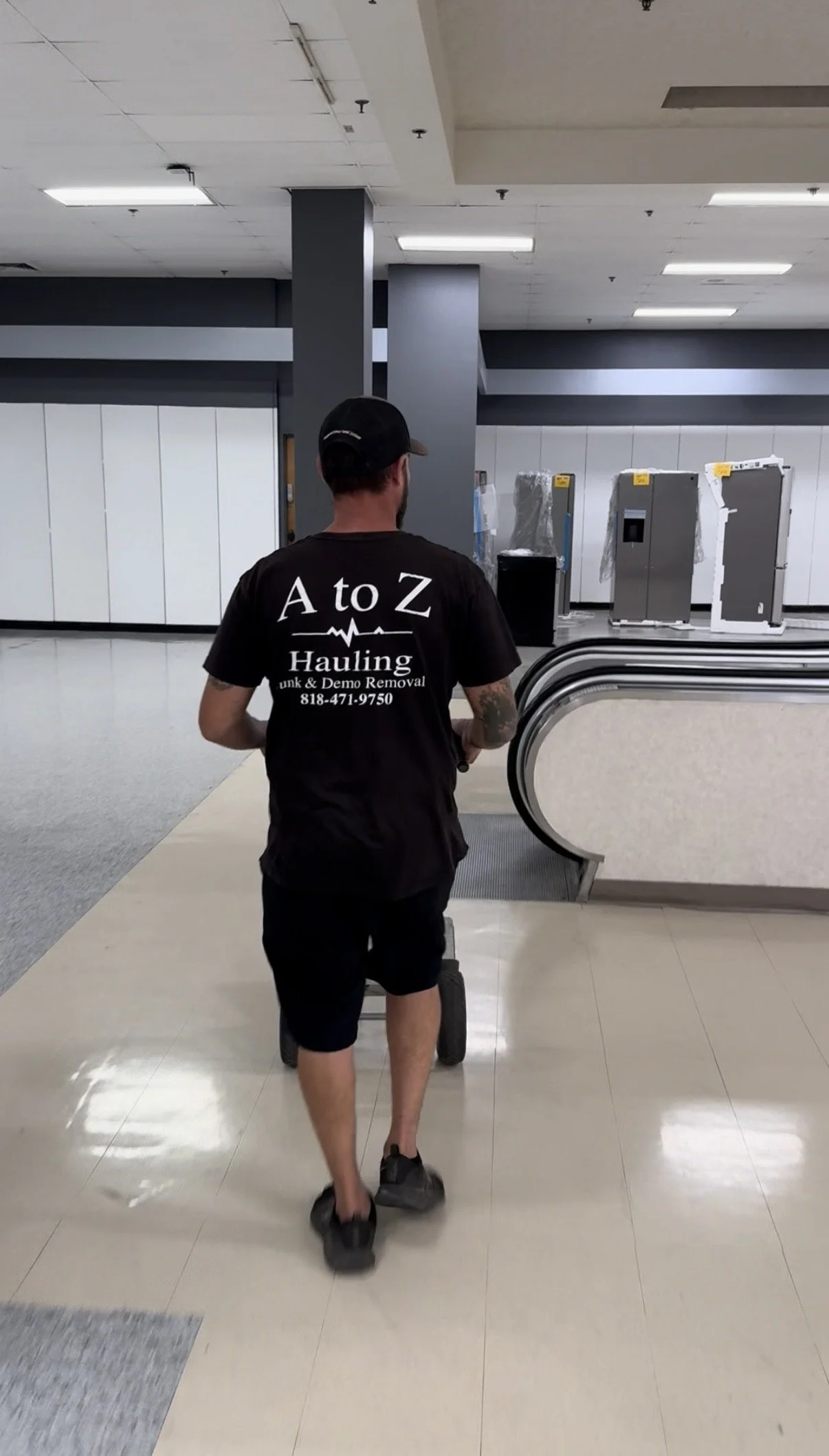 A TO Z HAULING JUNK REMOVAL DOING A APPLIANCE REMOVAL FROM THE SEARs in Burbank, ca