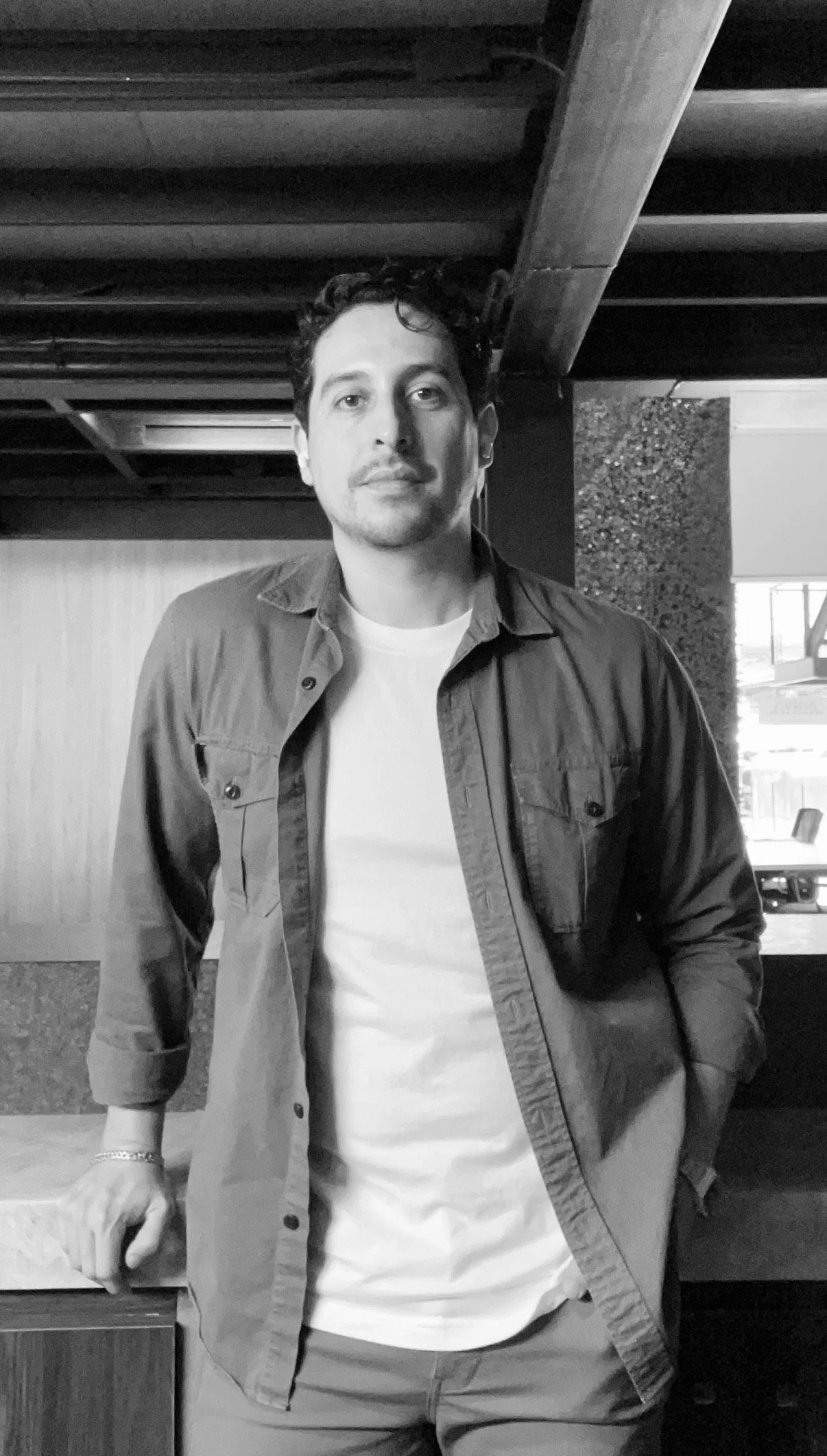 portrait of artist and painter Fernando Javier Valadez in black and white.