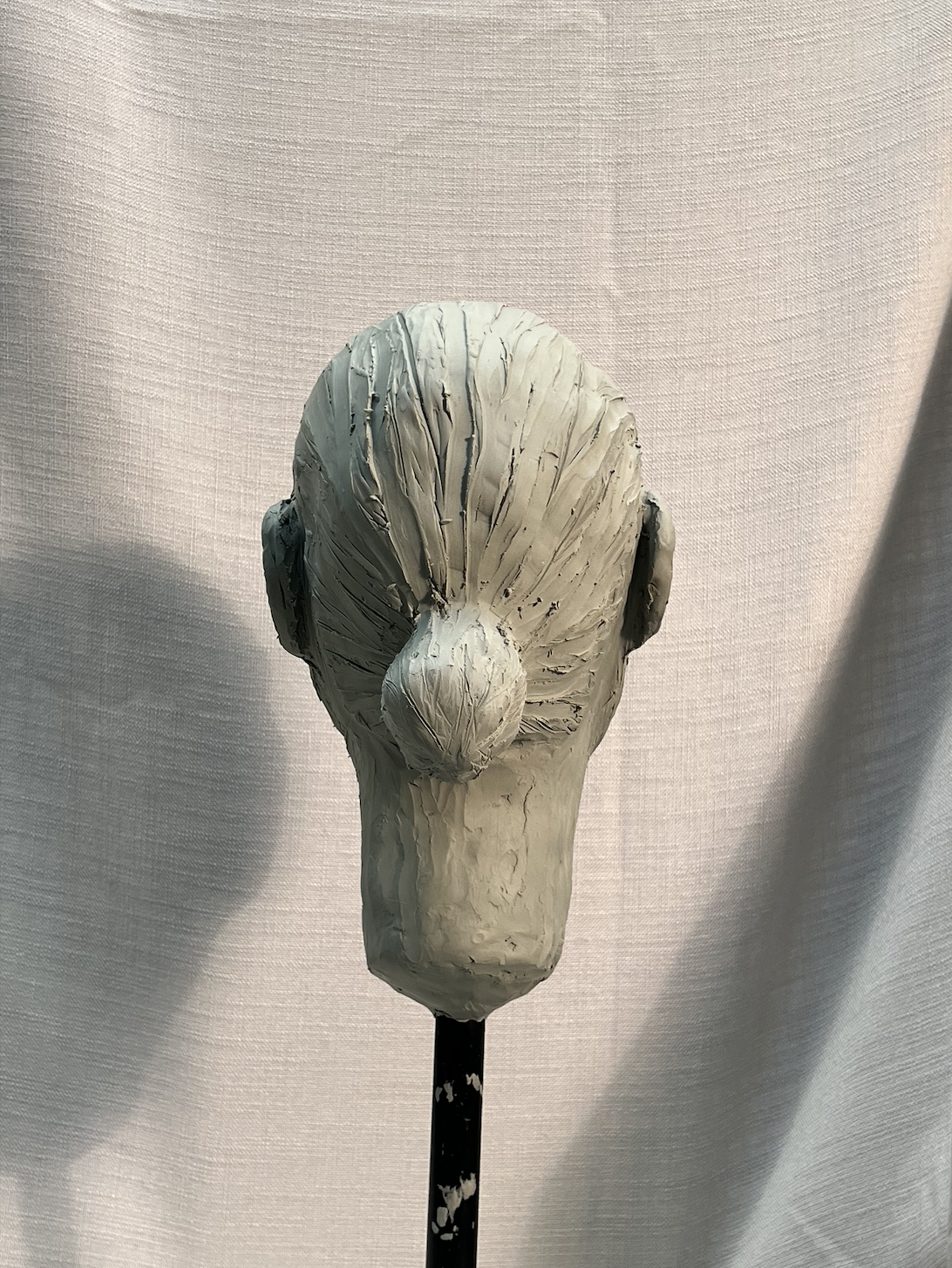 clay head back, life size