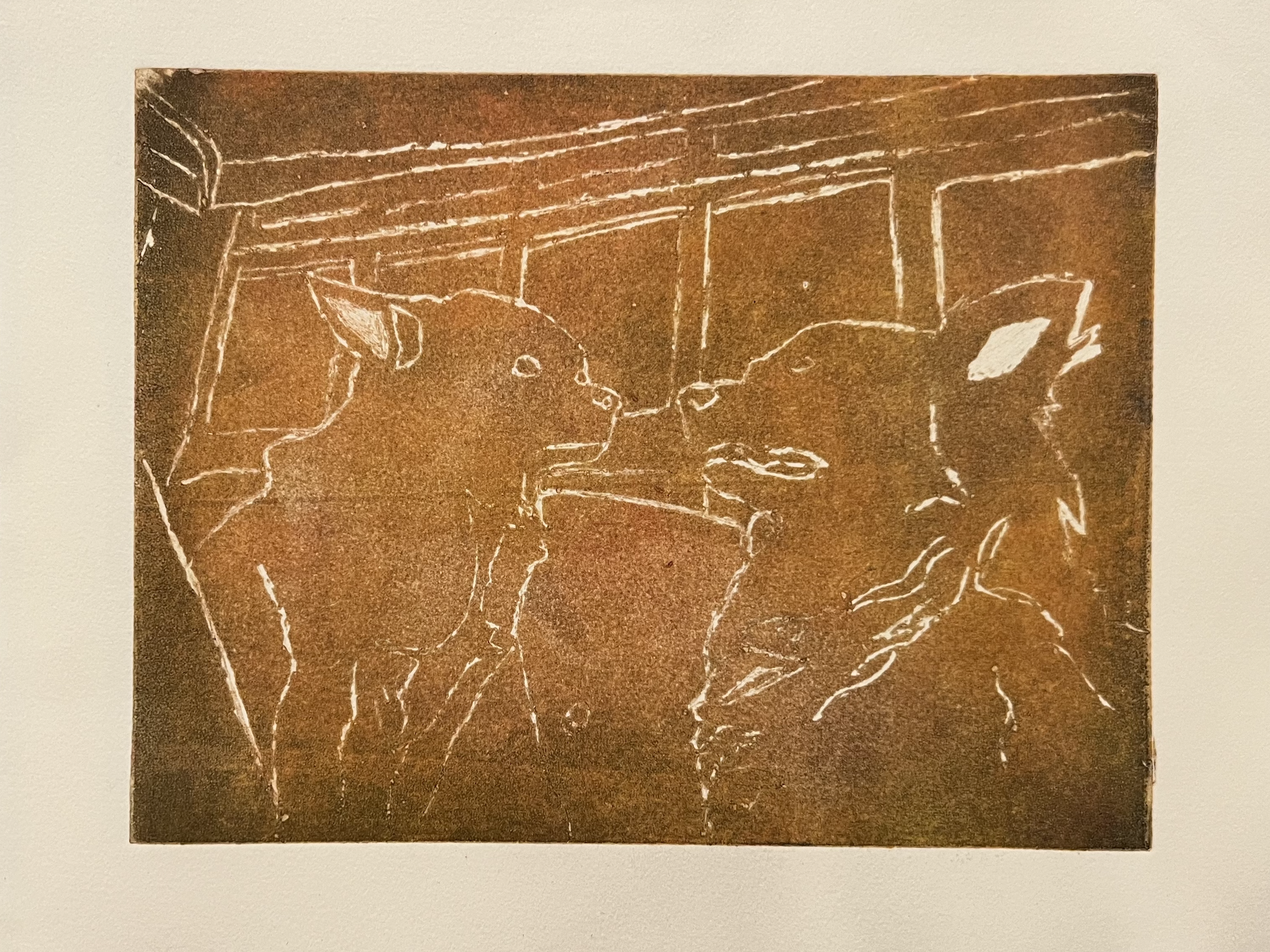 Line drawing of two dogs facing each other.
