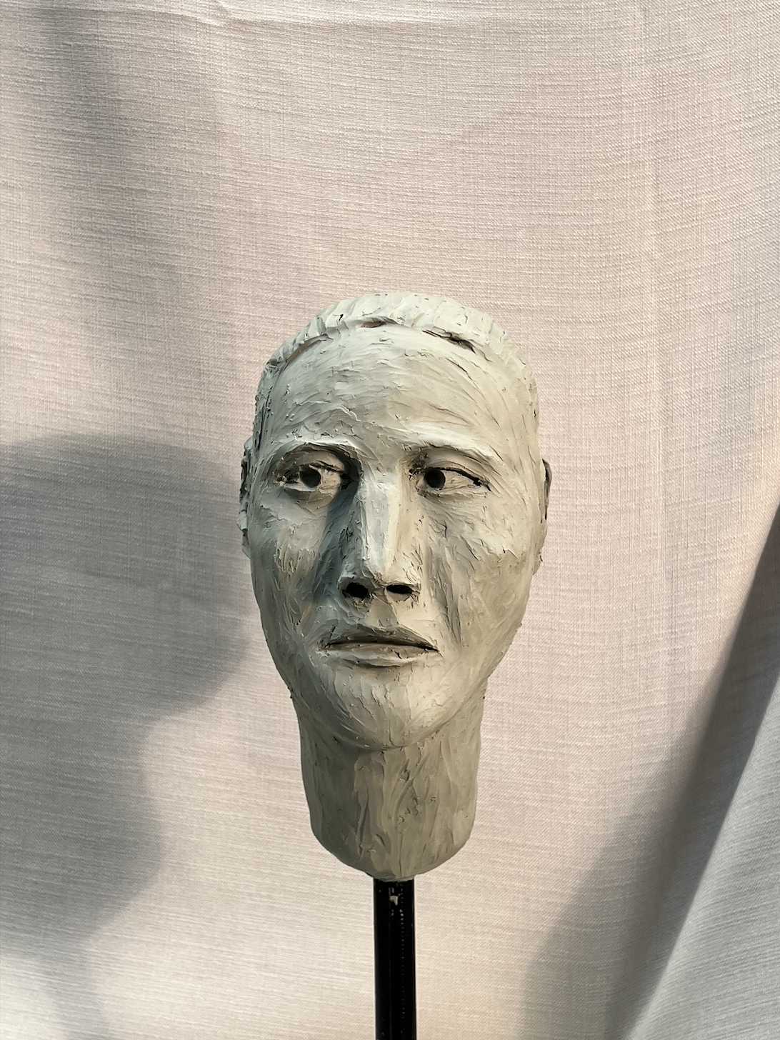 MAN, clay head front, life size