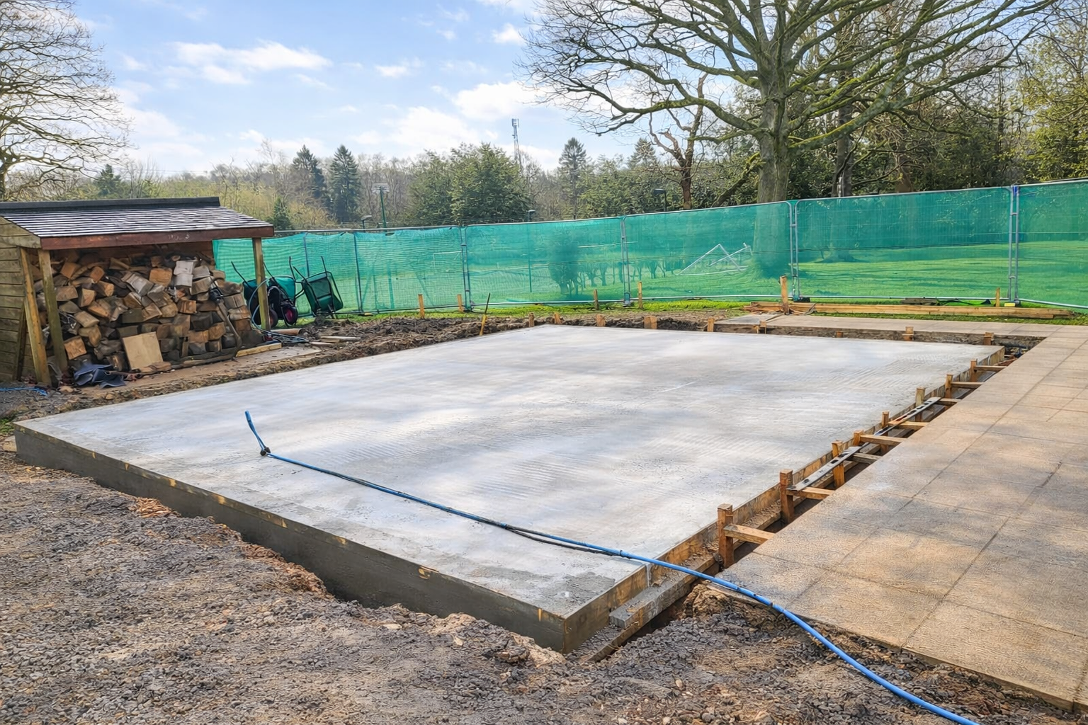 Piled waffle pod concrete slab system reducing concrete use while improving strength and efficiency