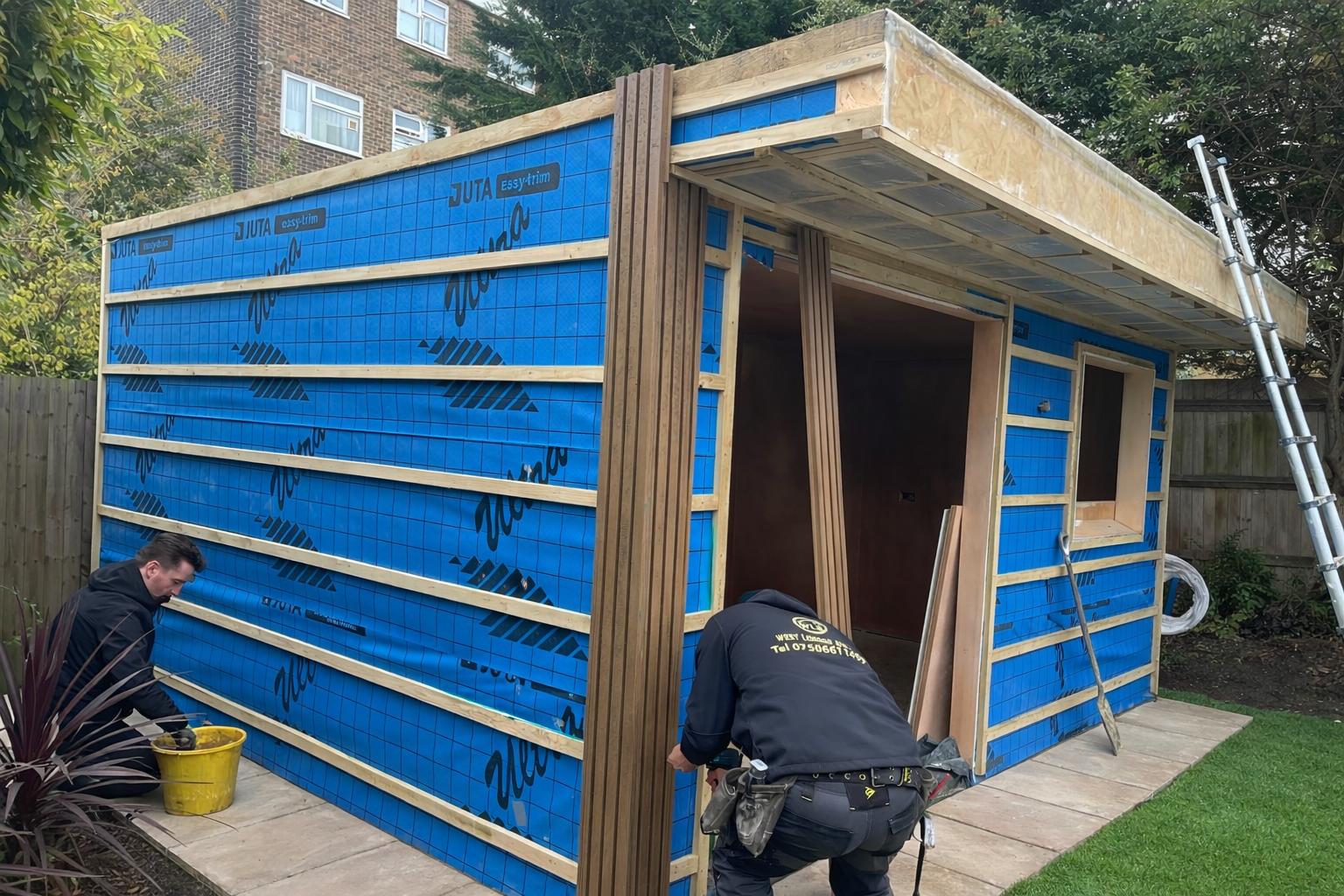 Insulated garden room in Wandsworth with breathable membrane and premium composite cladding
