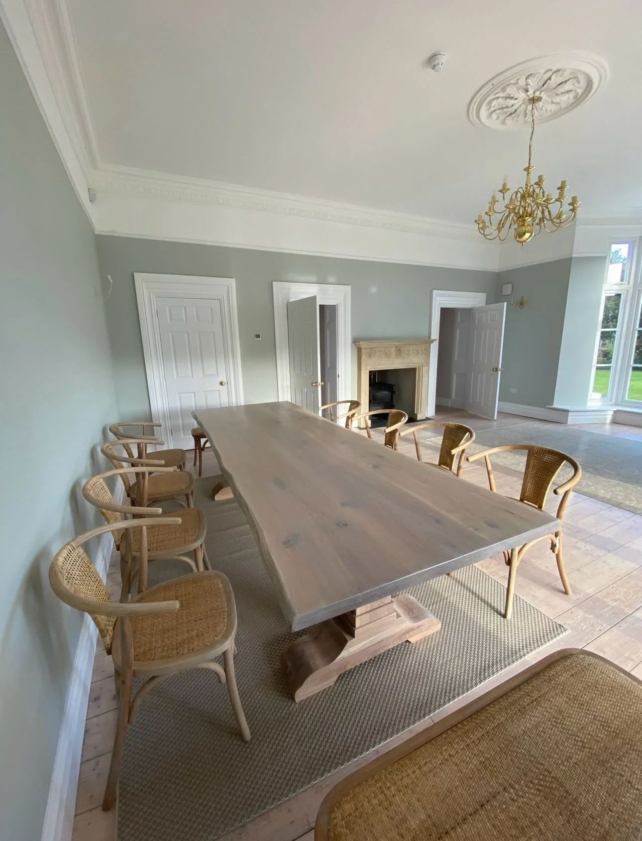 Picking up where I left off, the front room was painted out last year but the customer recently added a beautiful custom wood table which I then applied a white tinted food safe oil finish.