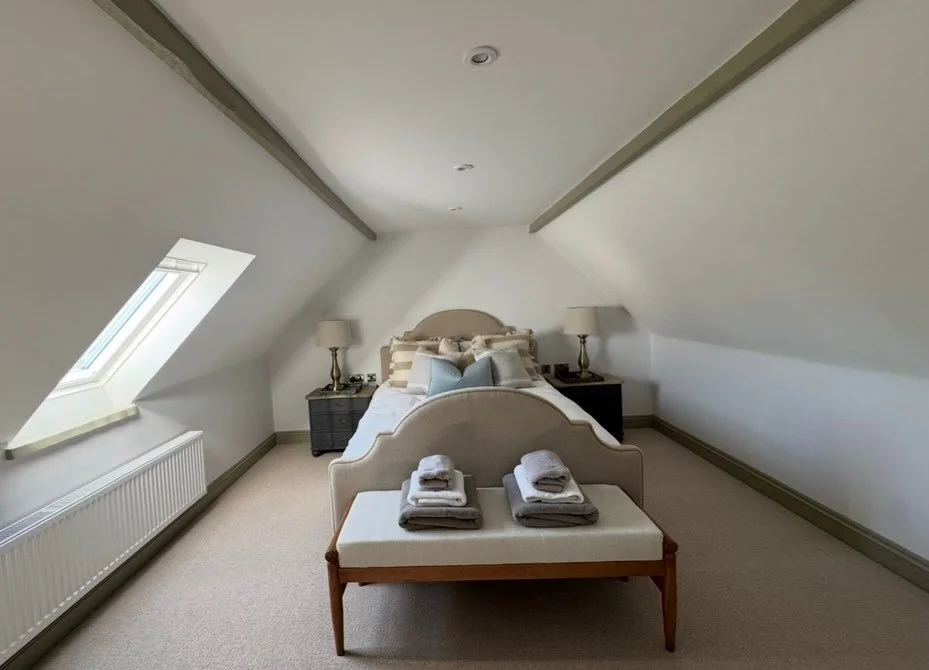 This rental was fully painted out, client chose a green trim through the project, including doors and built in wardrobes. Came out stunning! 
Seen in the pictures master bedroom on the top floor.