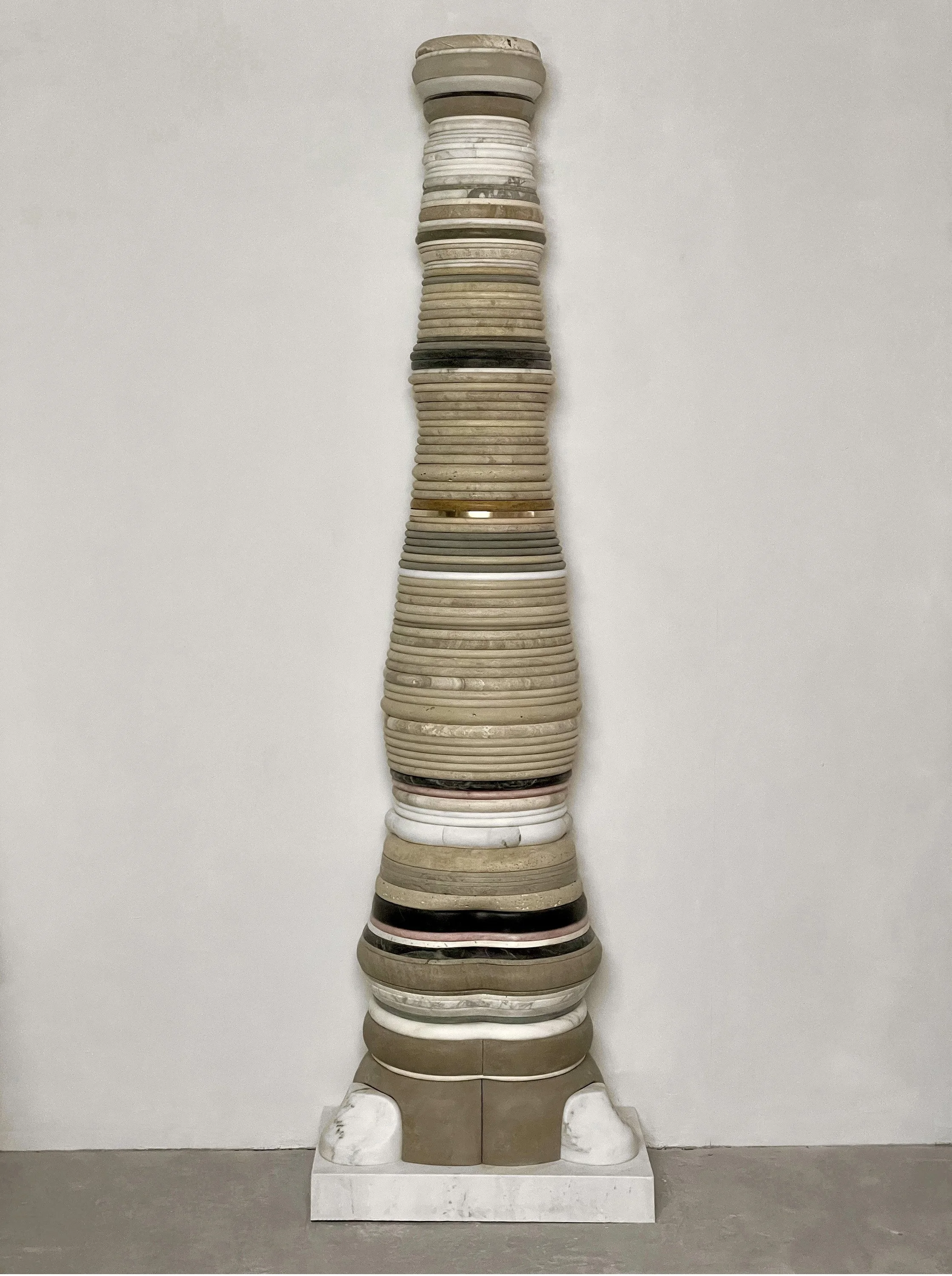 Collective 2, 2022, Marble, limestone and brass, 102 x 17 x 29 inches