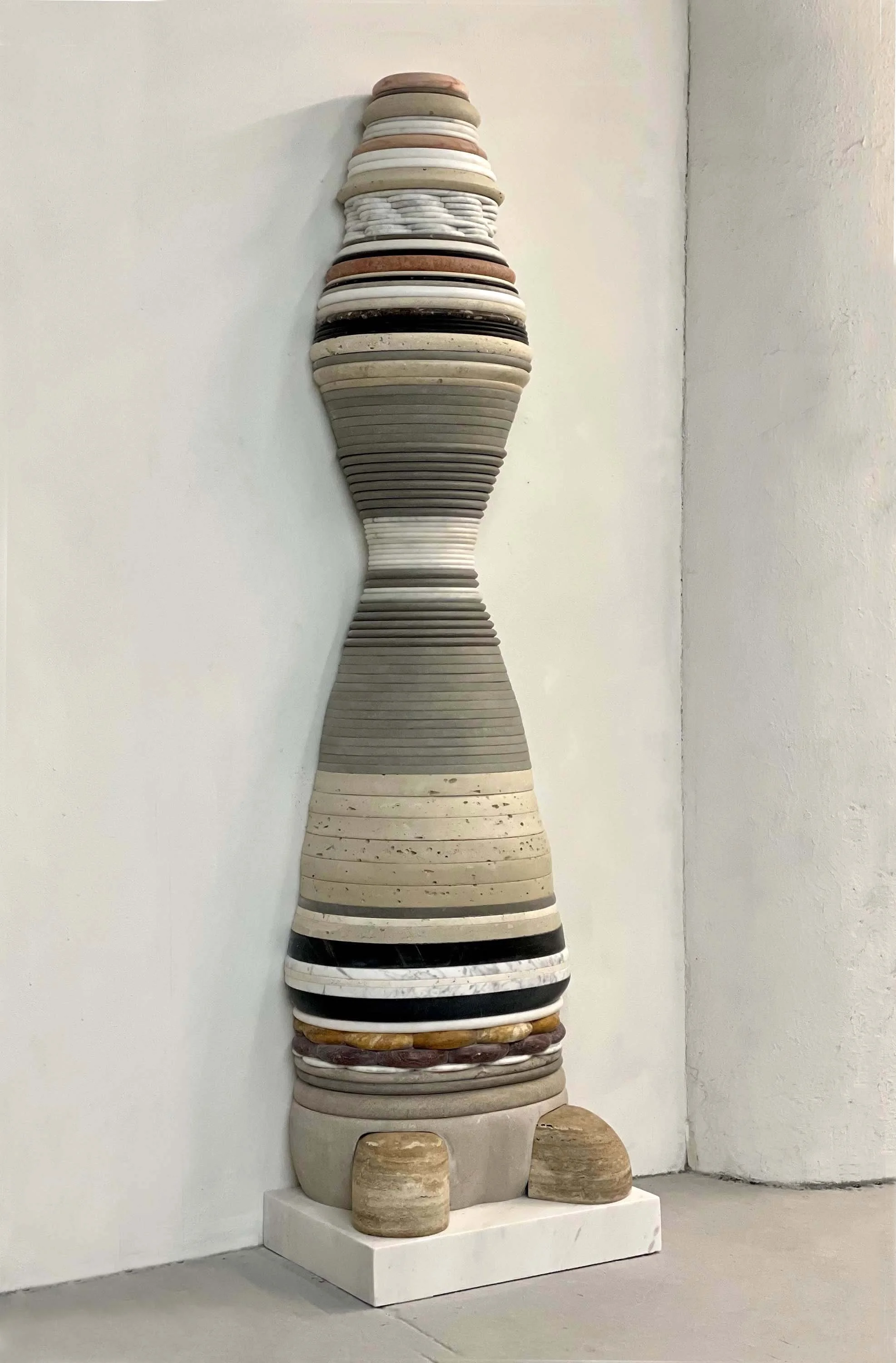 Collective, 2022, Marble and limestone,    
87 x 24 x 17 inches