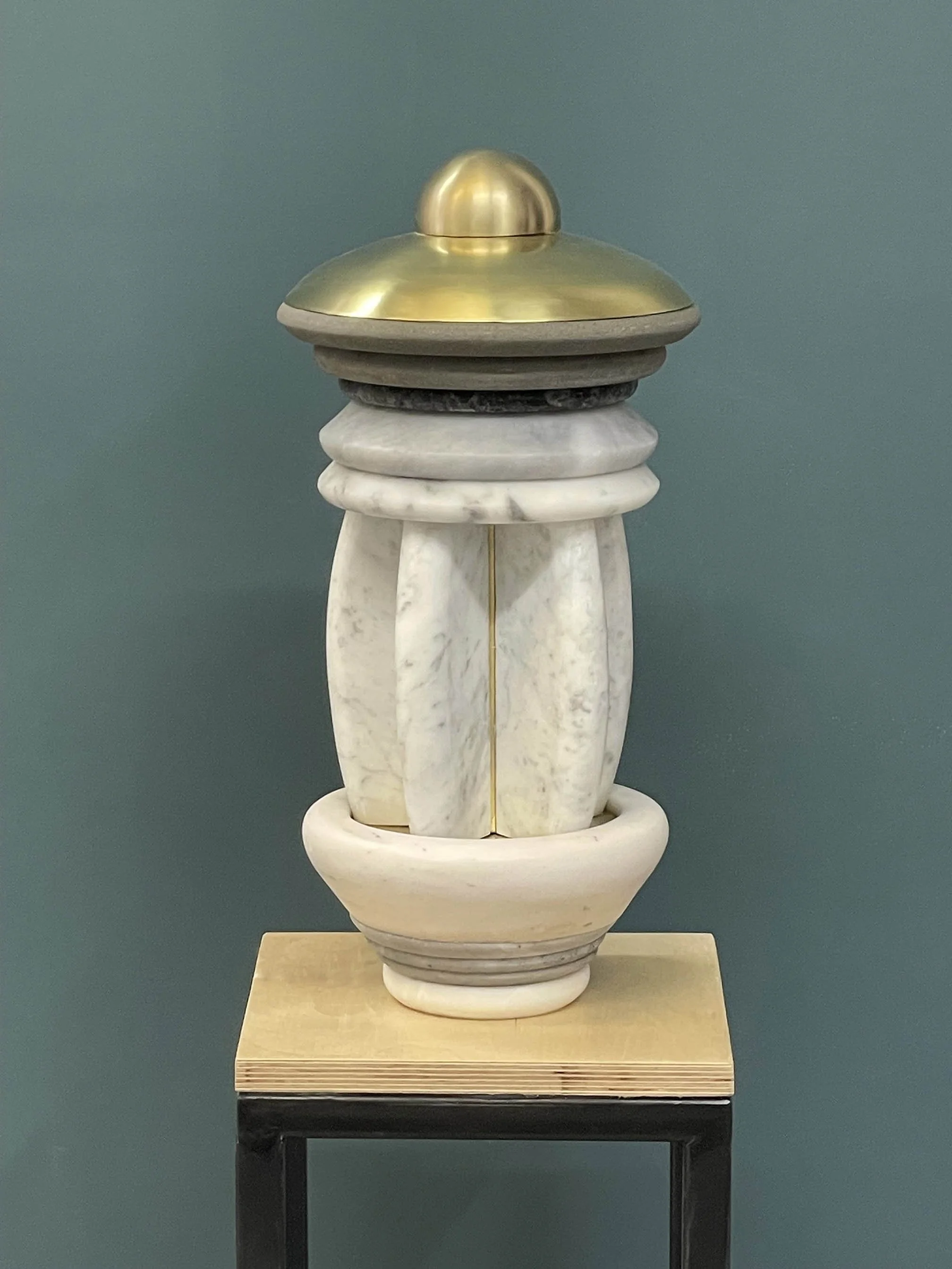 Stories We Tell 6, 2026, Marble, sandstone and brass, 19 x 9 1/2 x 9 1/2 inches