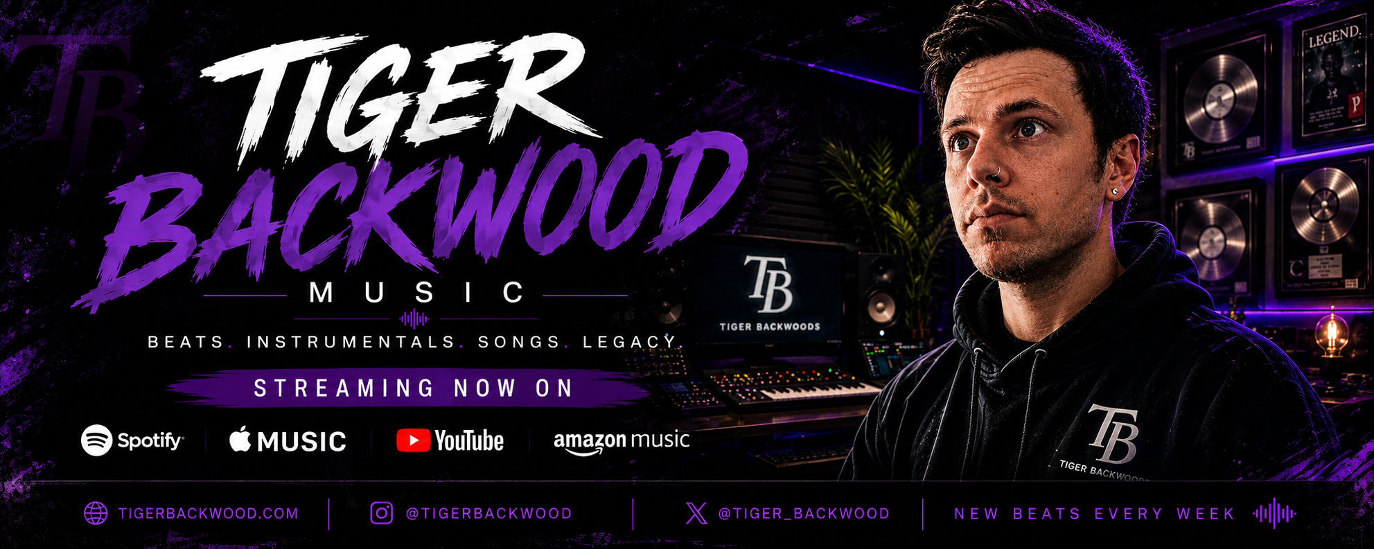 Promotional digital graphic for Tiger Backwood's music streaming, featuring a young man with dark hair and a nose piercing, sitting in a music studio with purple and black color scheme, various audio equipment, and awards on the wall. Text mentions streaming on Spotify, Apple Music, YouTube, and Amazon Music, with social media links and a weekly release schedule.