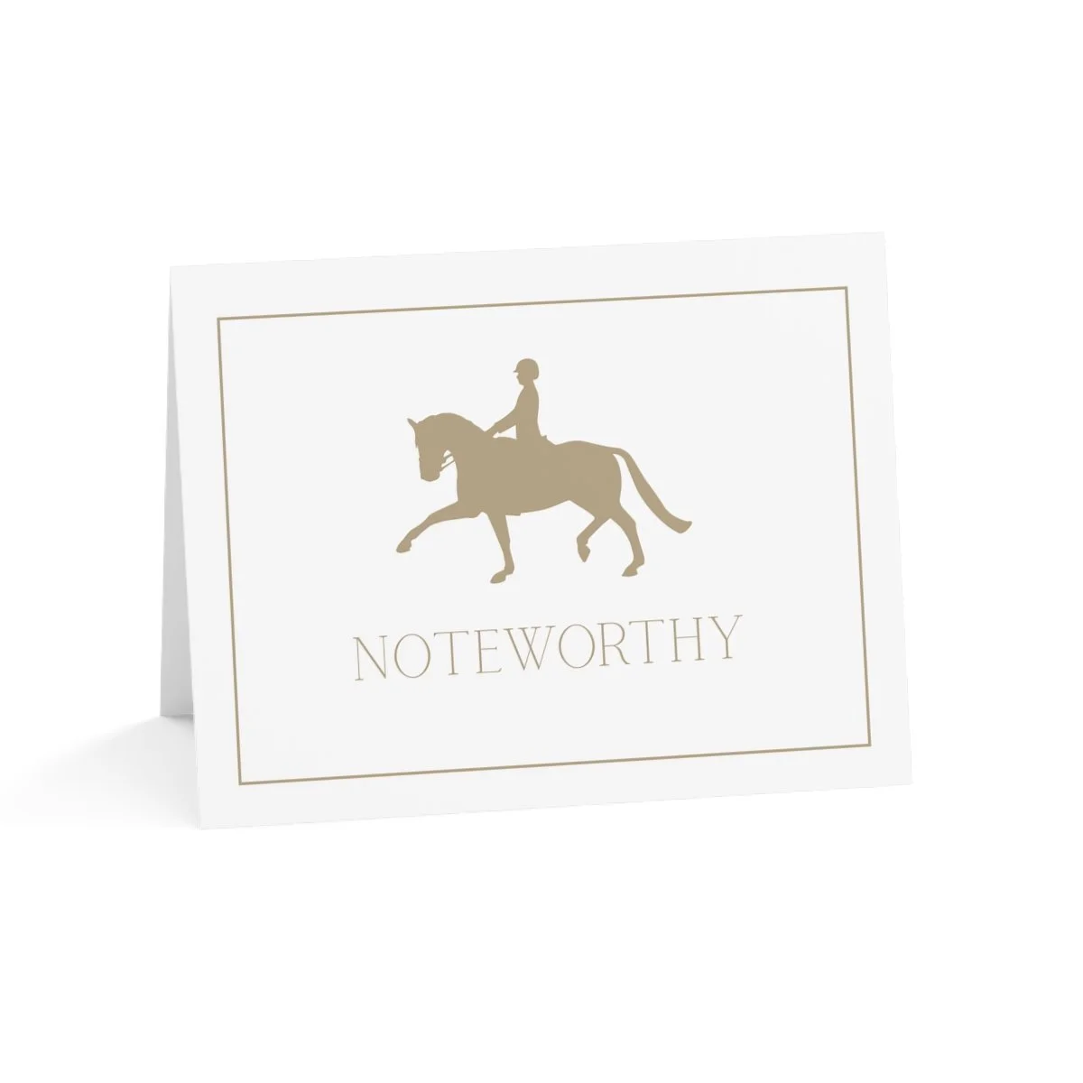 Folded card with dressage horse and rider that reads Noteworthy