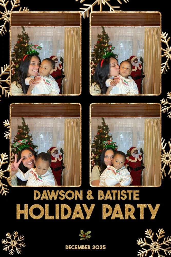Kee Kreates Photo Booth. Celebrating the Dawson & Batiste Holiday Party in December 2025. The woman is wearing a Christmas headband with green sparkles, and the boy is dressed in a white shirt with red lettering.