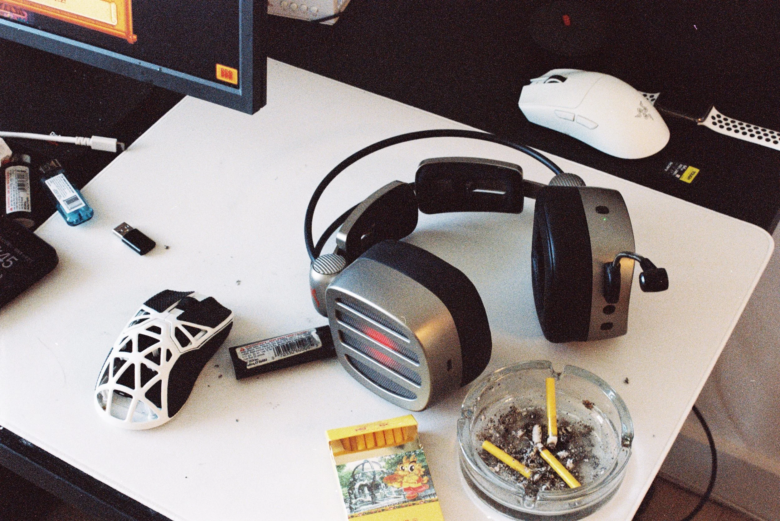 Headphones and cigarette butts, Chromogenic film
