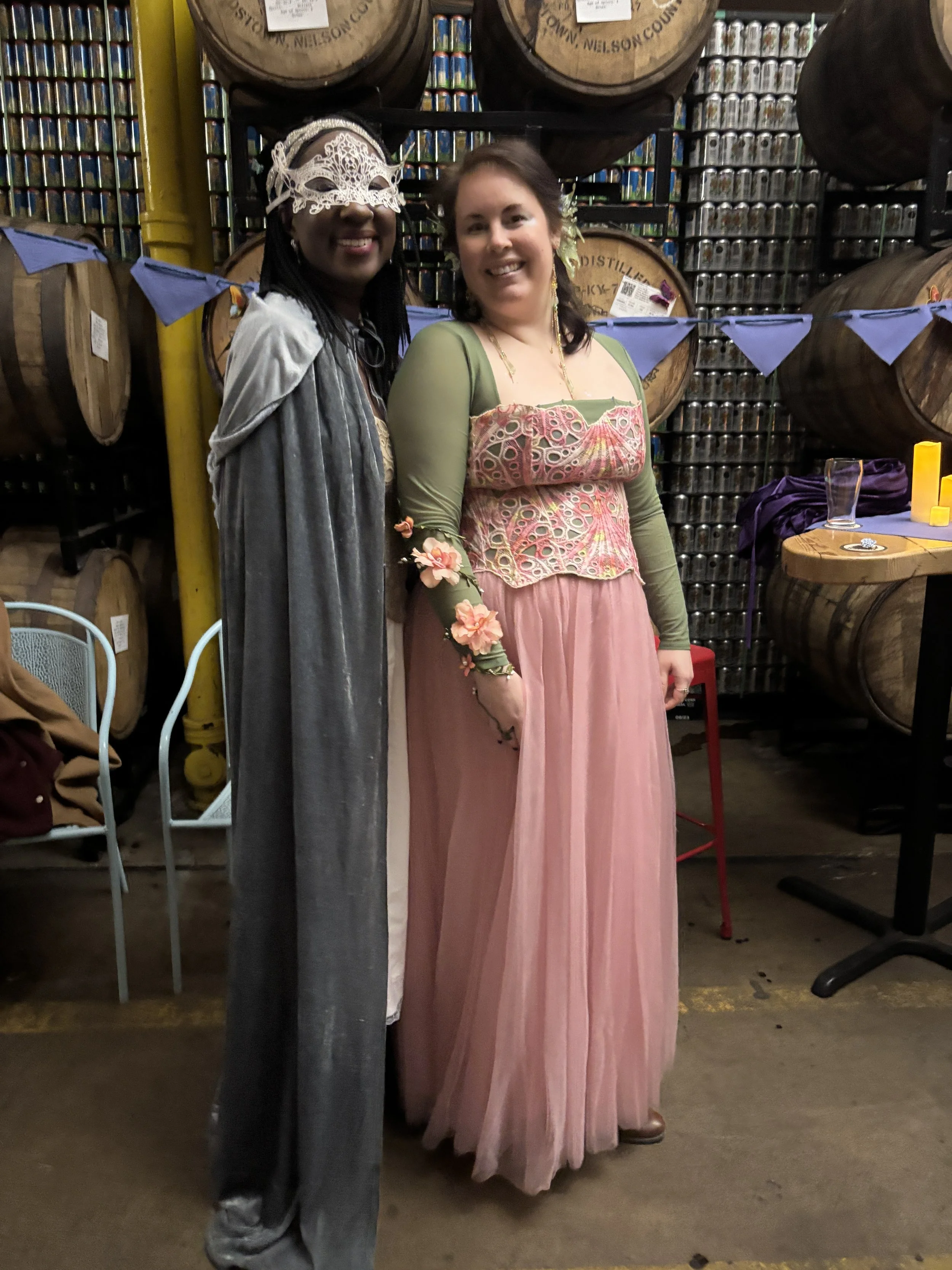 Masked woman and friend in Fantasy attire