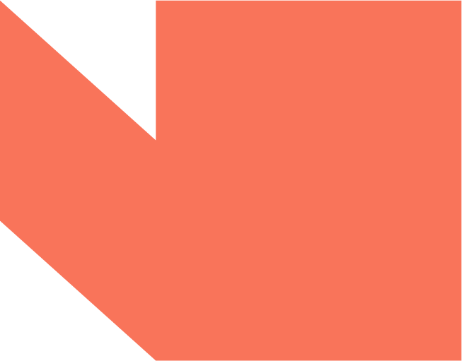 Close-up of a soccer ball on a grassy field with a sunset sky in the background.