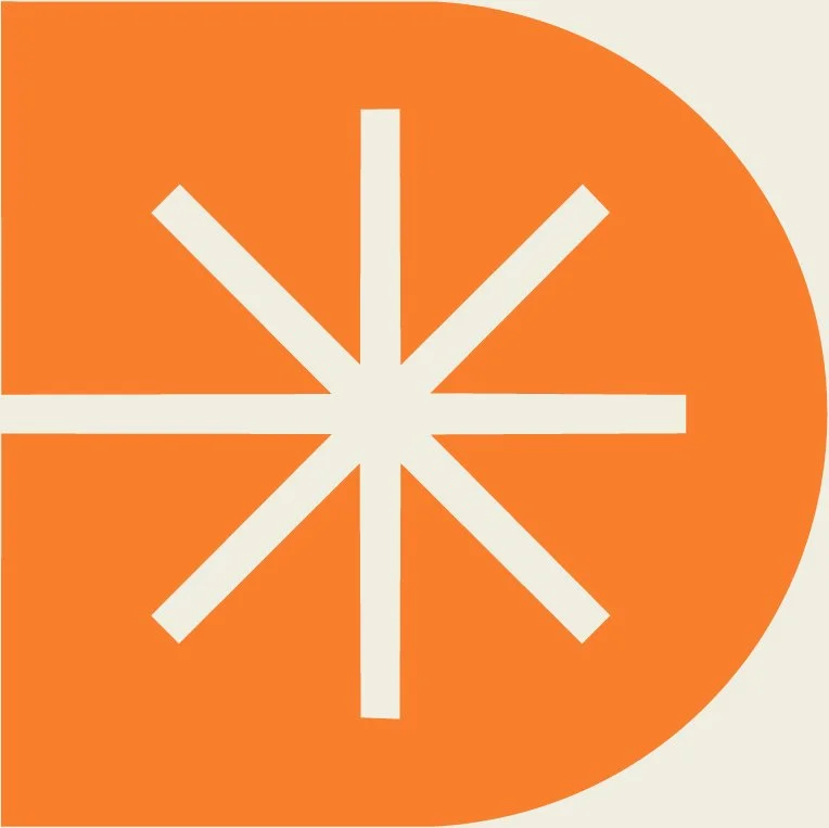 A geometric design with an orange background and white lines forming an asterisk shape in the center, partially cut off by a rounded edge.