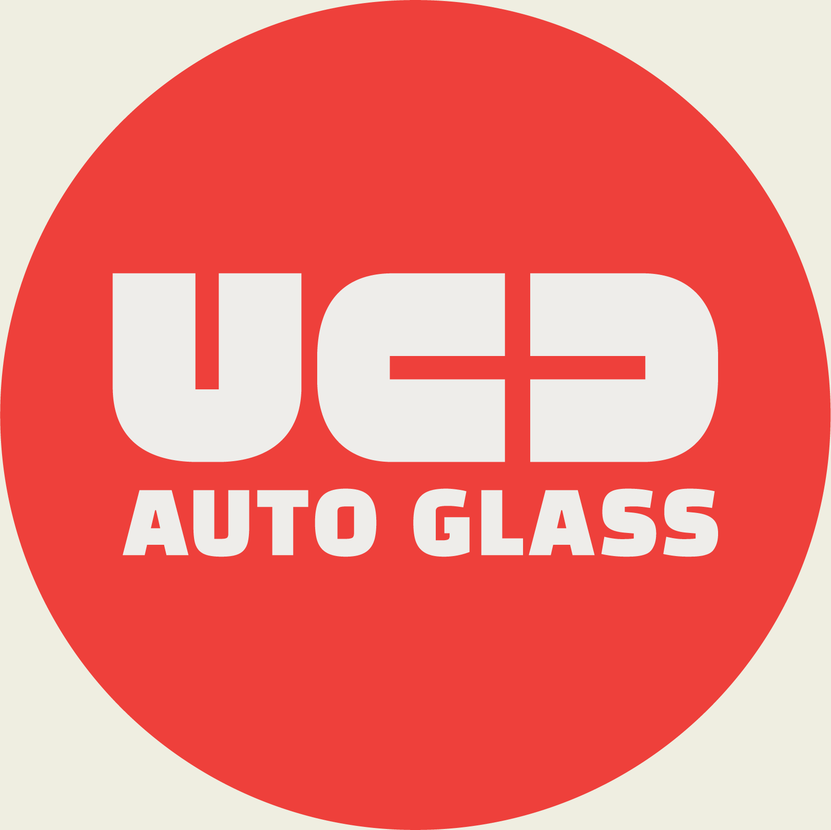 Red circular logo with white text that reads "UCD Auto Glass".