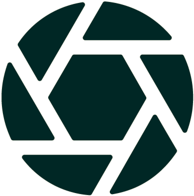 Stylized camera shutter icon with a hexagon in the center