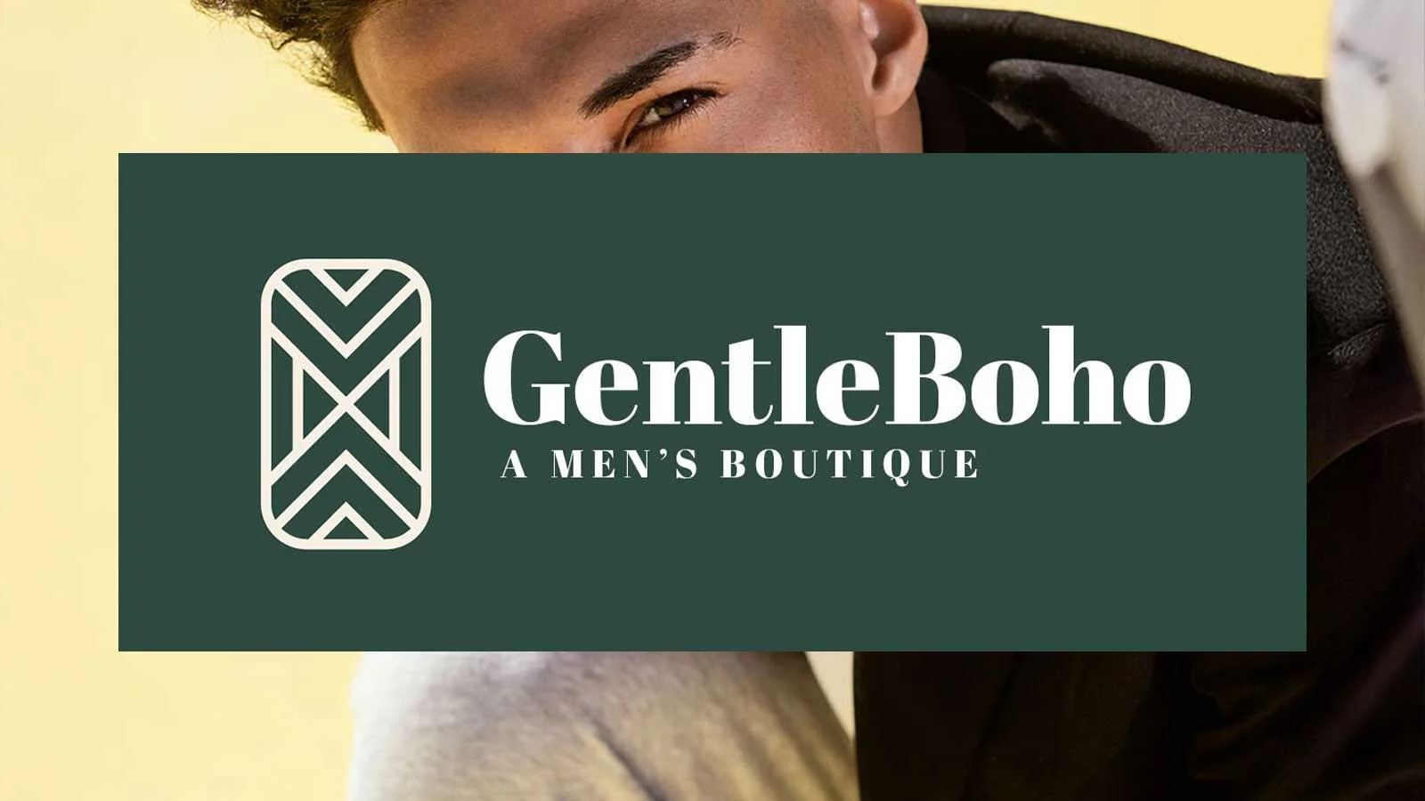 A logo for GentleBoho, a men's boutique, with a stylized, geometric icon and the text 'GentleBoho A Men's Boutique' overlaid on a background featuring part of a young man's face and shoulder.