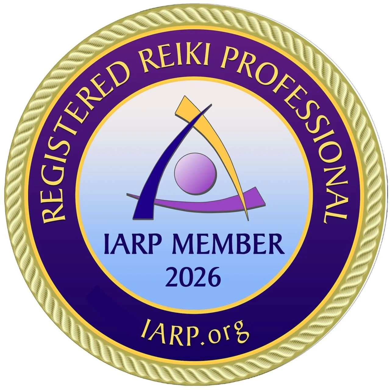 Gold and purple embroidered badge for the International Association of Reiki Professionals featuring a central Reiki symbol, text indicating IARP membership for 2026, and the website IARP.org.