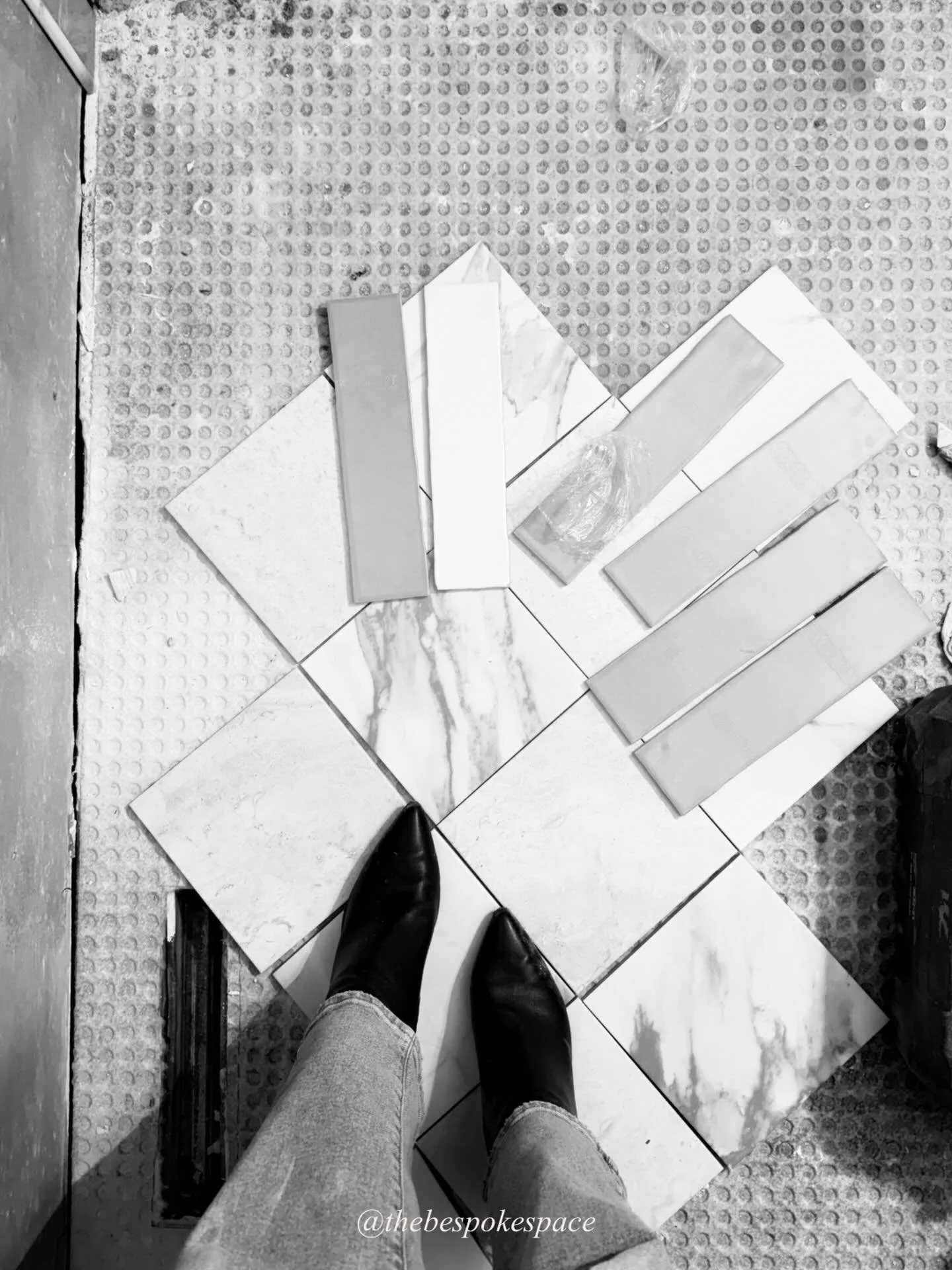Full service interior design means full service.

Today that looked like getting down on the floor of an active job site to lay out tile combinations, test grout colors in the actual lighting conditions, and answer every question the subs had before 