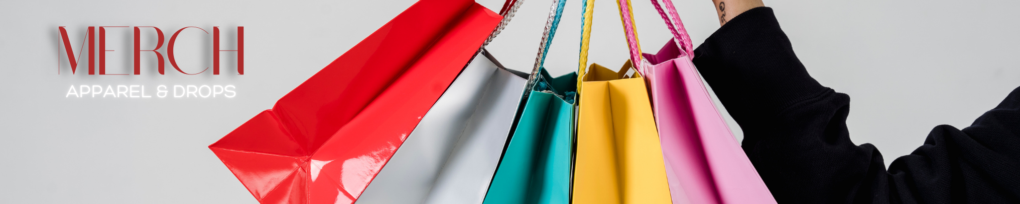 Someone holding colorful shopping bags, with text reading "Merch Apparel & Drops" on a light gray background.