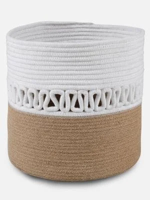 A decorative storage basket with a tan base, a white upper section, and a woven pattern in the middle.