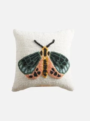 Decorative pillow featuring a colorful embroidered butterfly design.