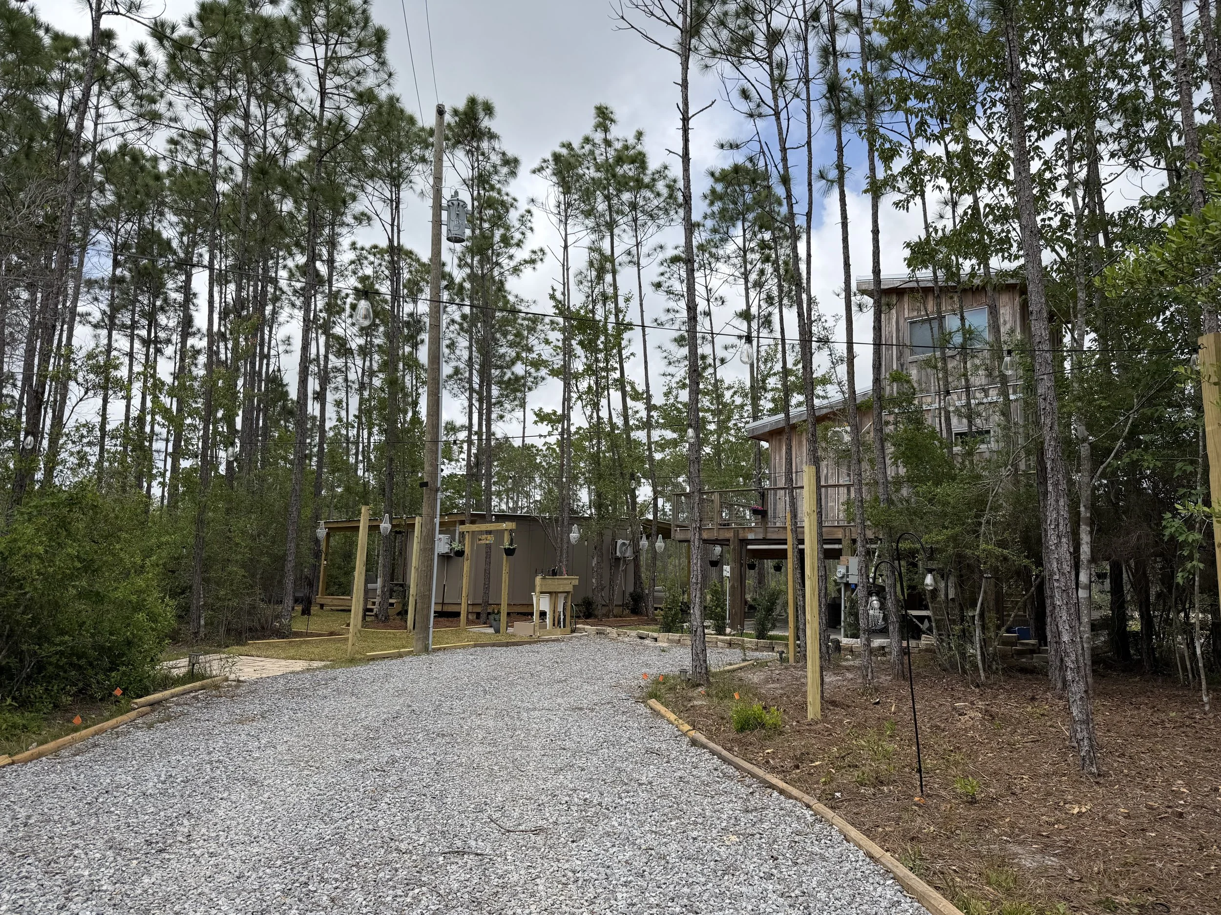 Water + Woods is an outdoor wedding and event venue in Gulf Shores, Alabama near Orange Beach and The Wharf.