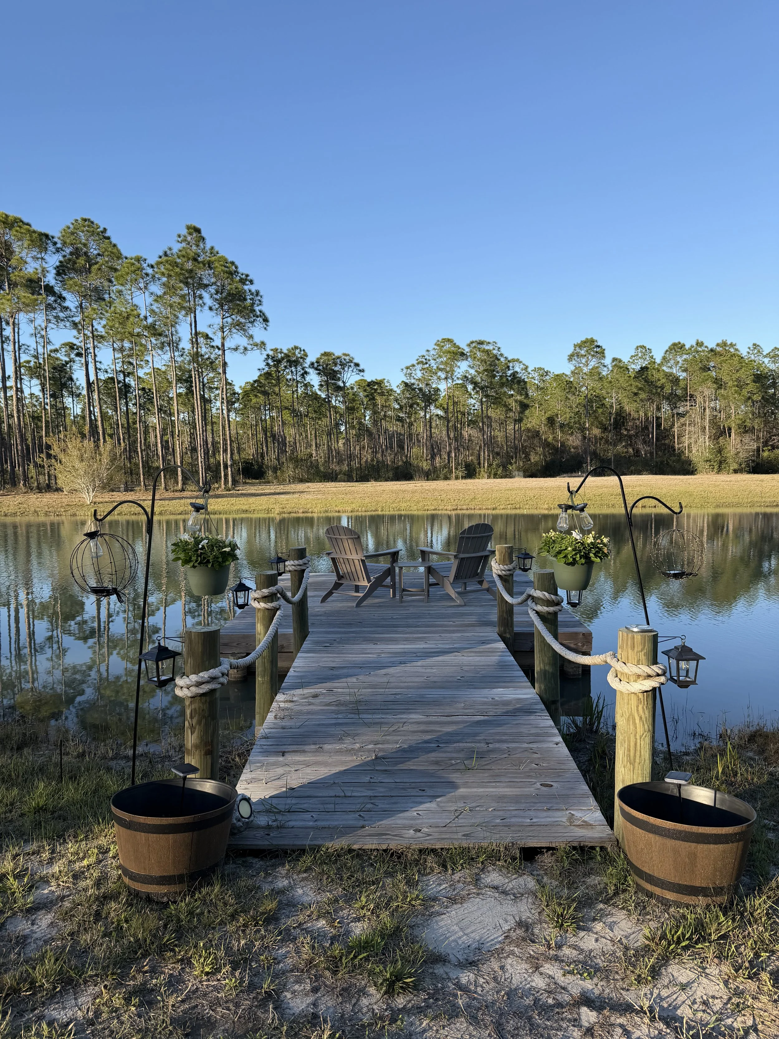 Water + Woods is an outdoor wedding and event venue in Gulf Shores, Alabama near Orange Beach and The Wharf.